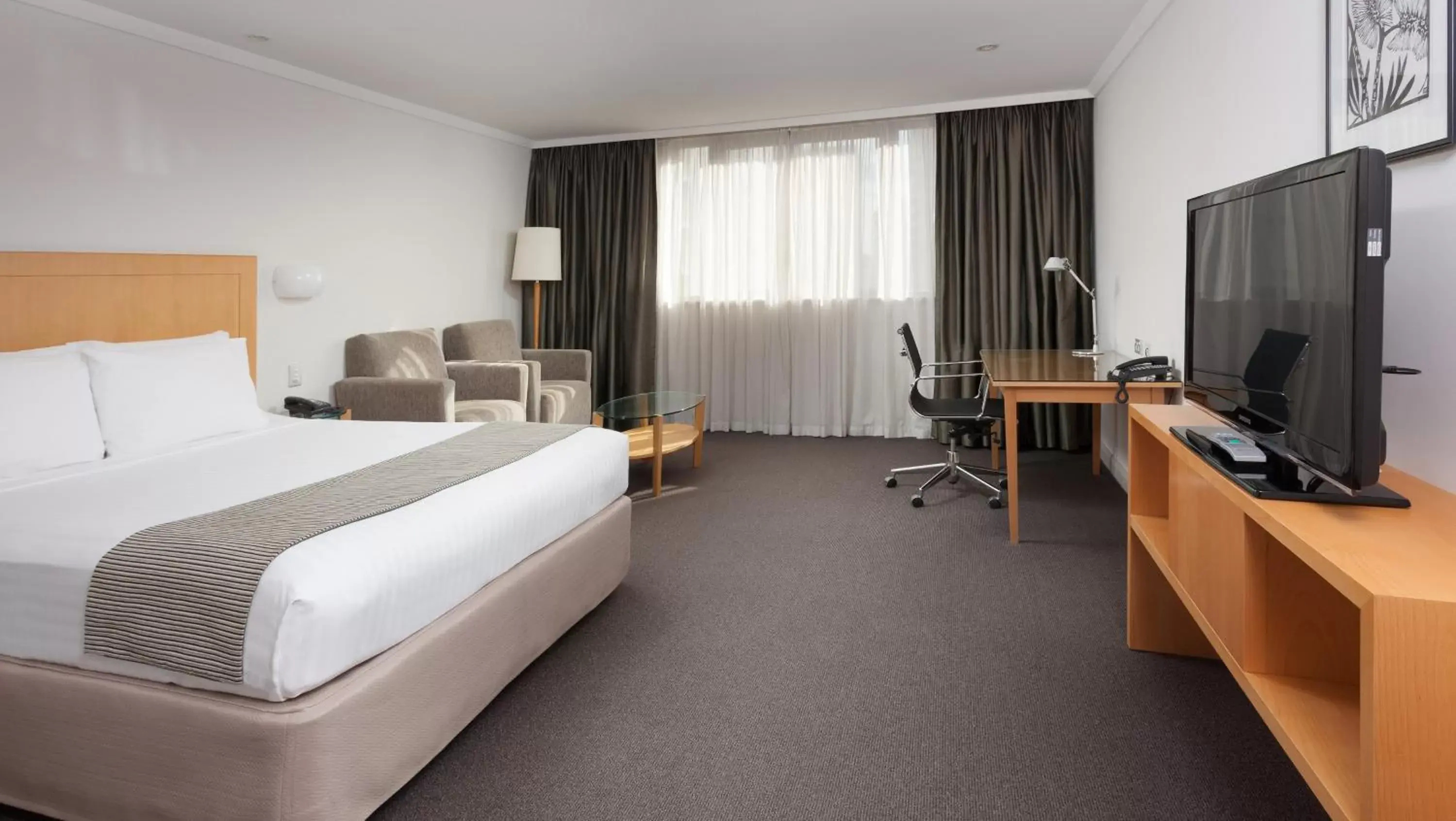 Photo of the whole room, TV/Entertainment Center in Crowne Plaza Perth, an IHG Hotel