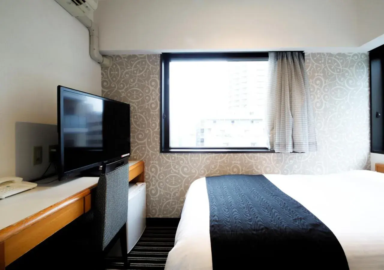 Photo of the whole room, Bed in Apa Hotel Tokyo-Ojima