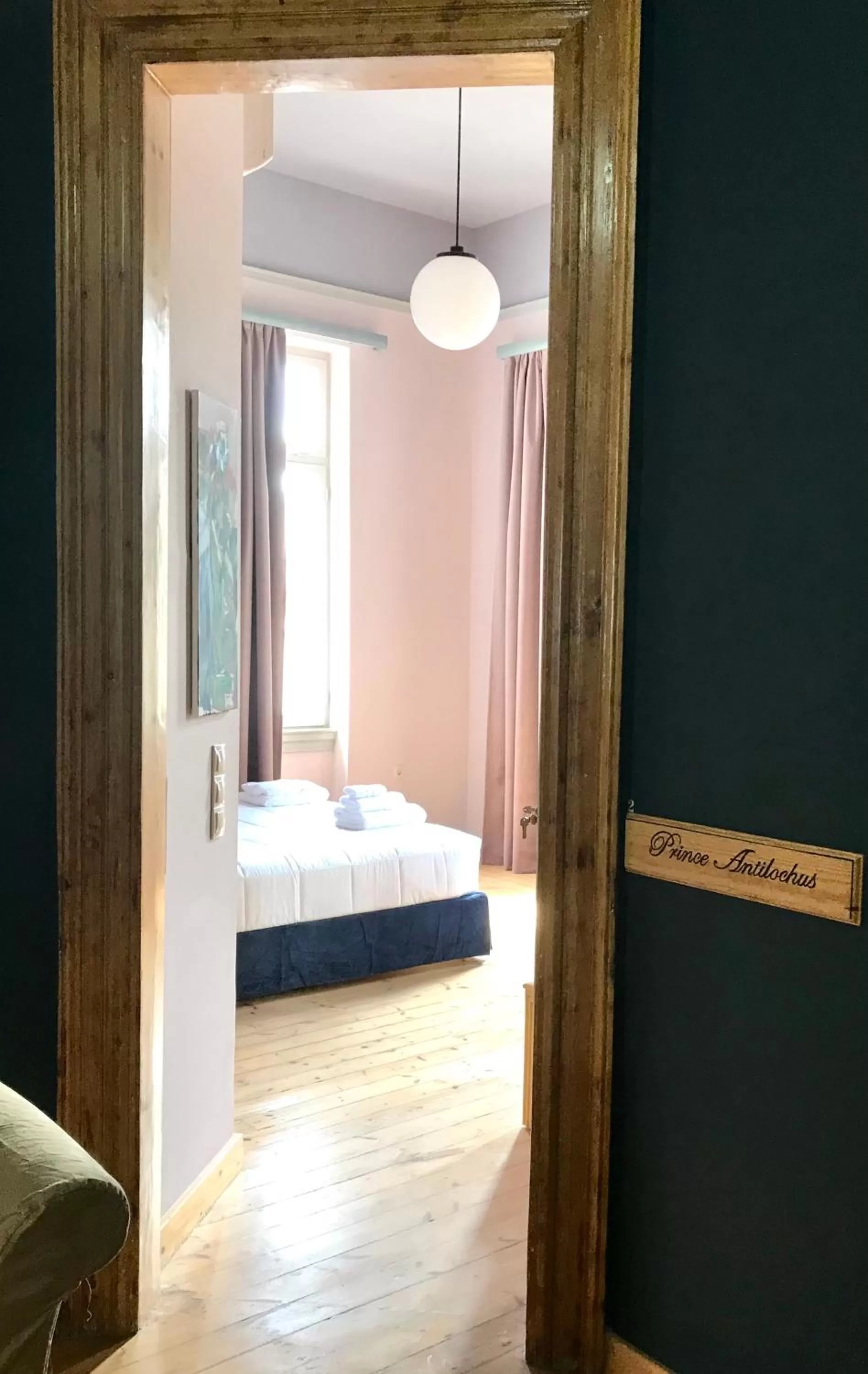 Photo of the whole room, Bed in VASILIKON Hotel 1888 the past is present HISTORICAL PRESERVATION MONUMENT