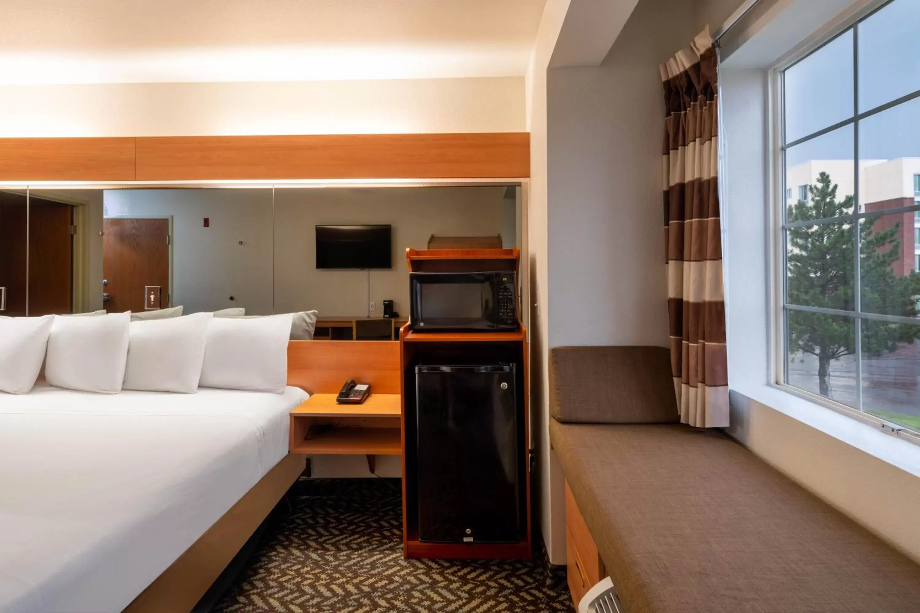 Bed in Microtel Inn & Suites by Wyndham Salt Lake City Airport