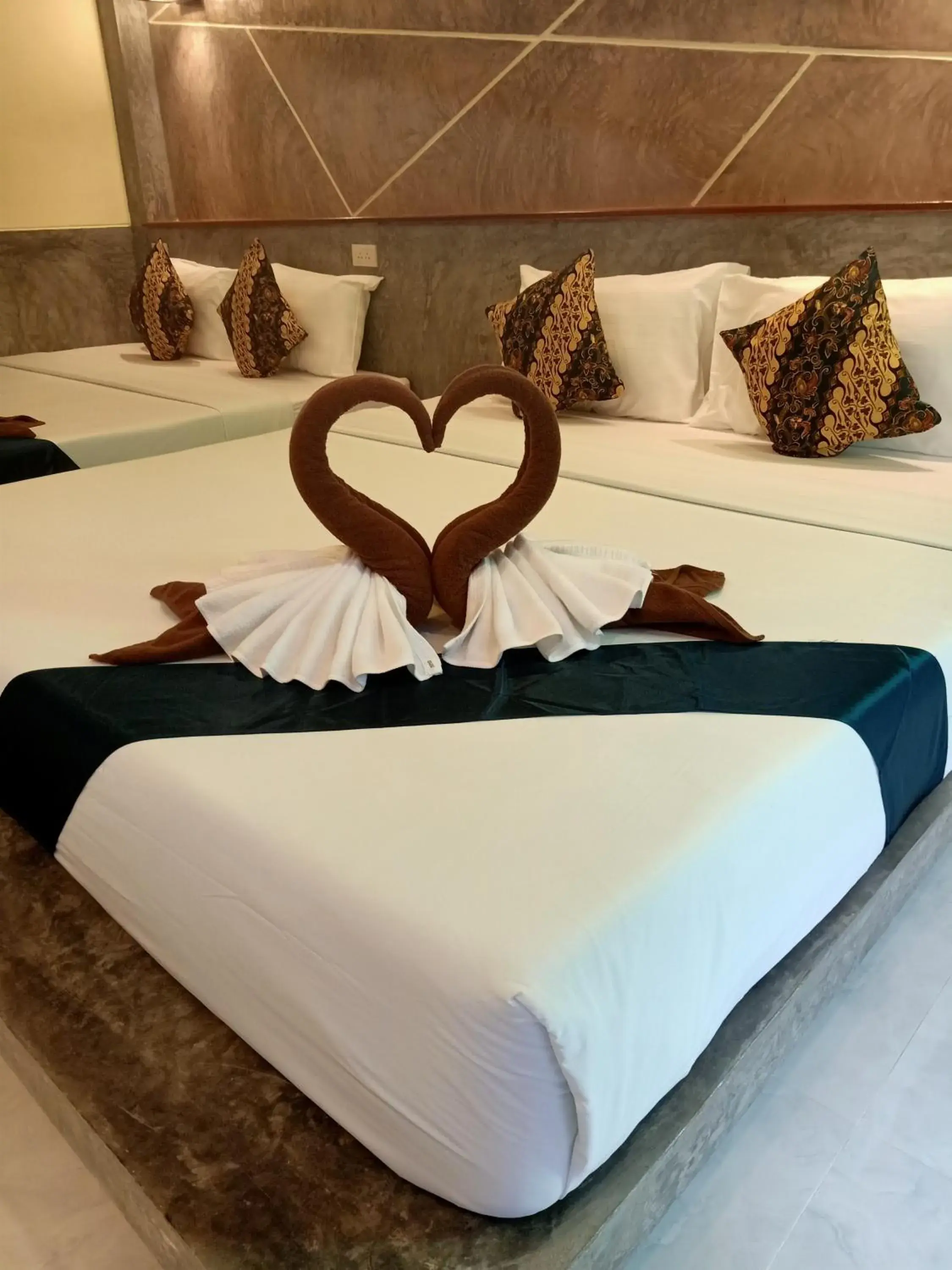 Bed in Lanta Pearl Beach Resort