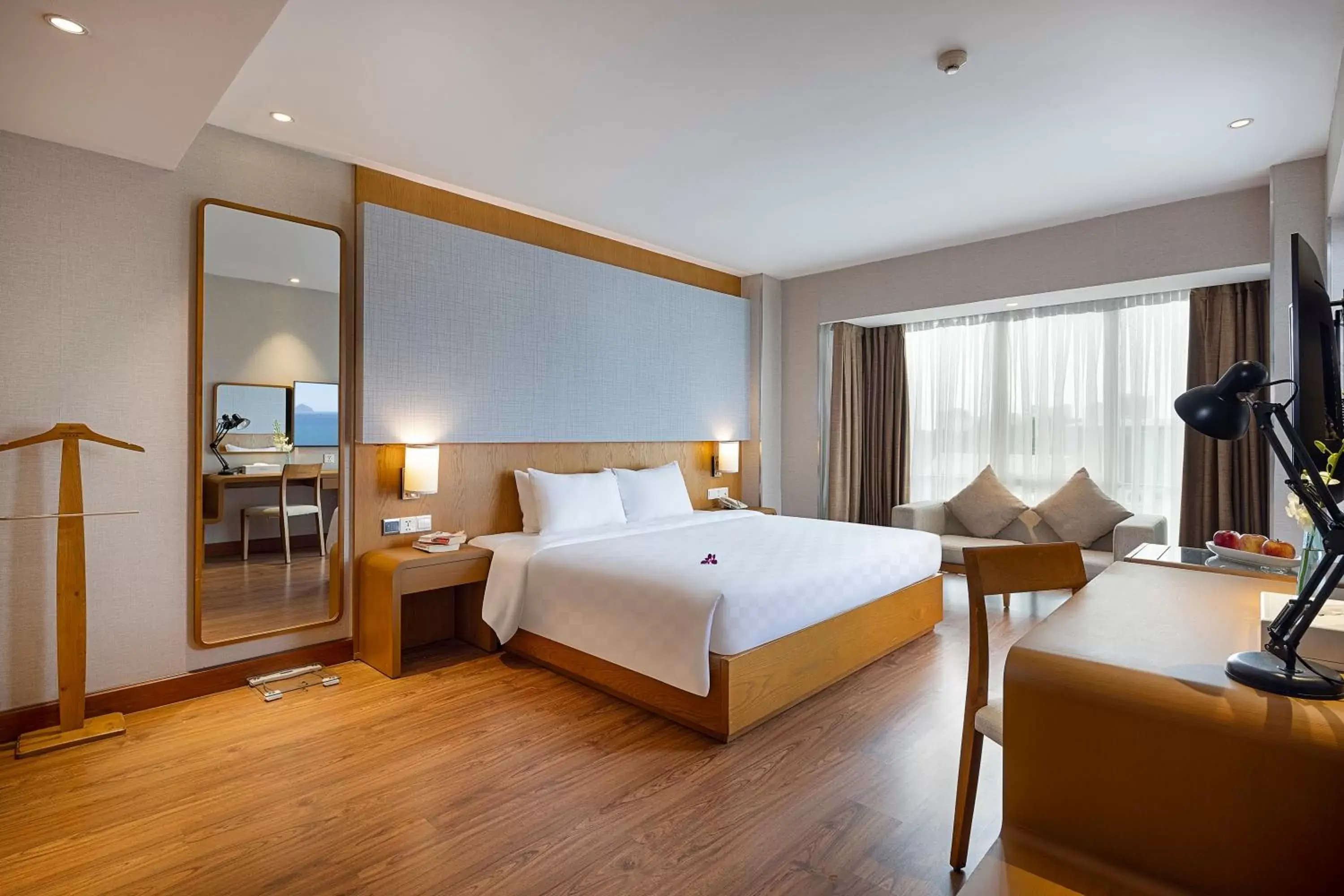 Bedroom in Harmony Saigon Hotel & Spa