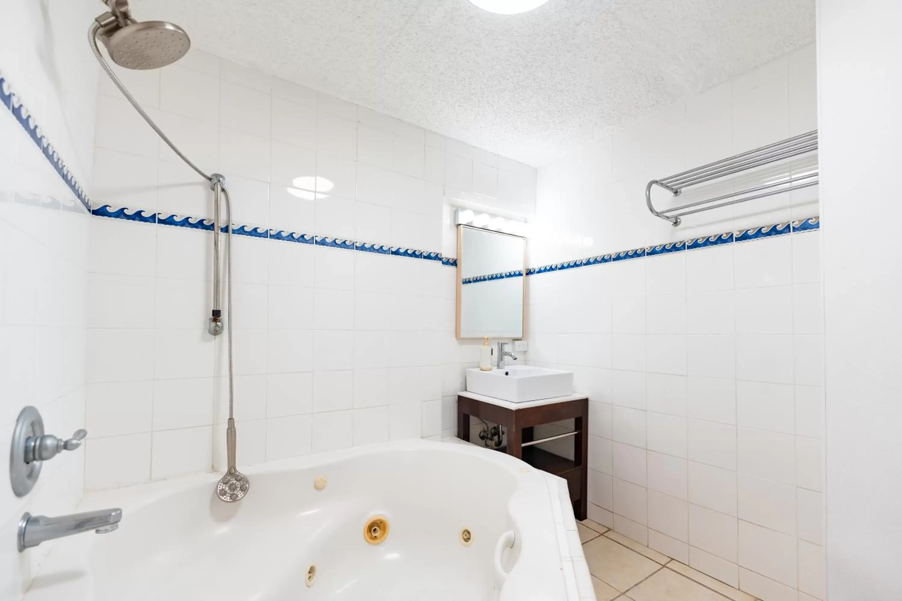 Bathroom in OCEAN VIEW DELUXE SUITE: PVT. BEACH & POOL