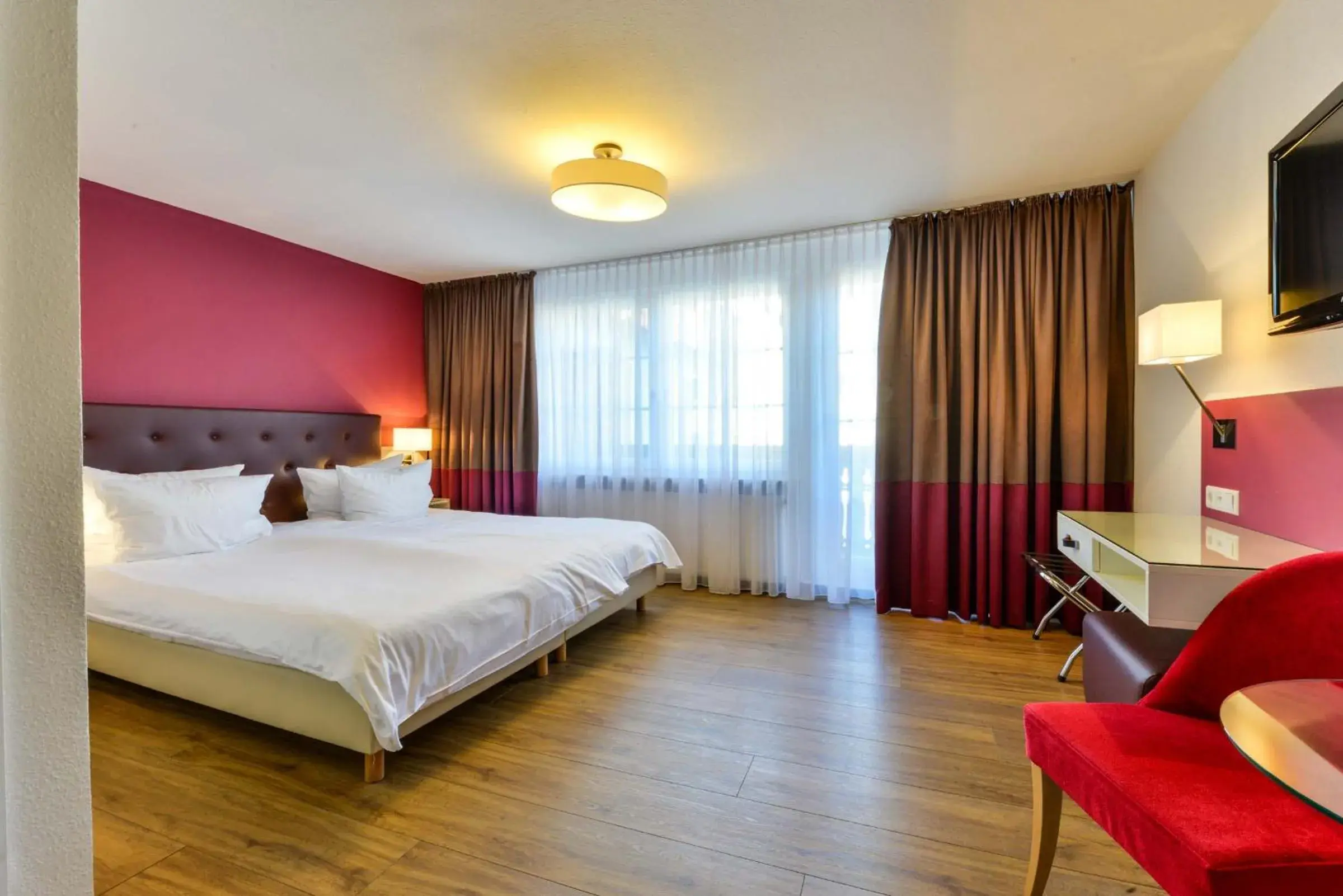 Photo of the whole room, Bed in Flair Hotel Vier Jahreszeiten