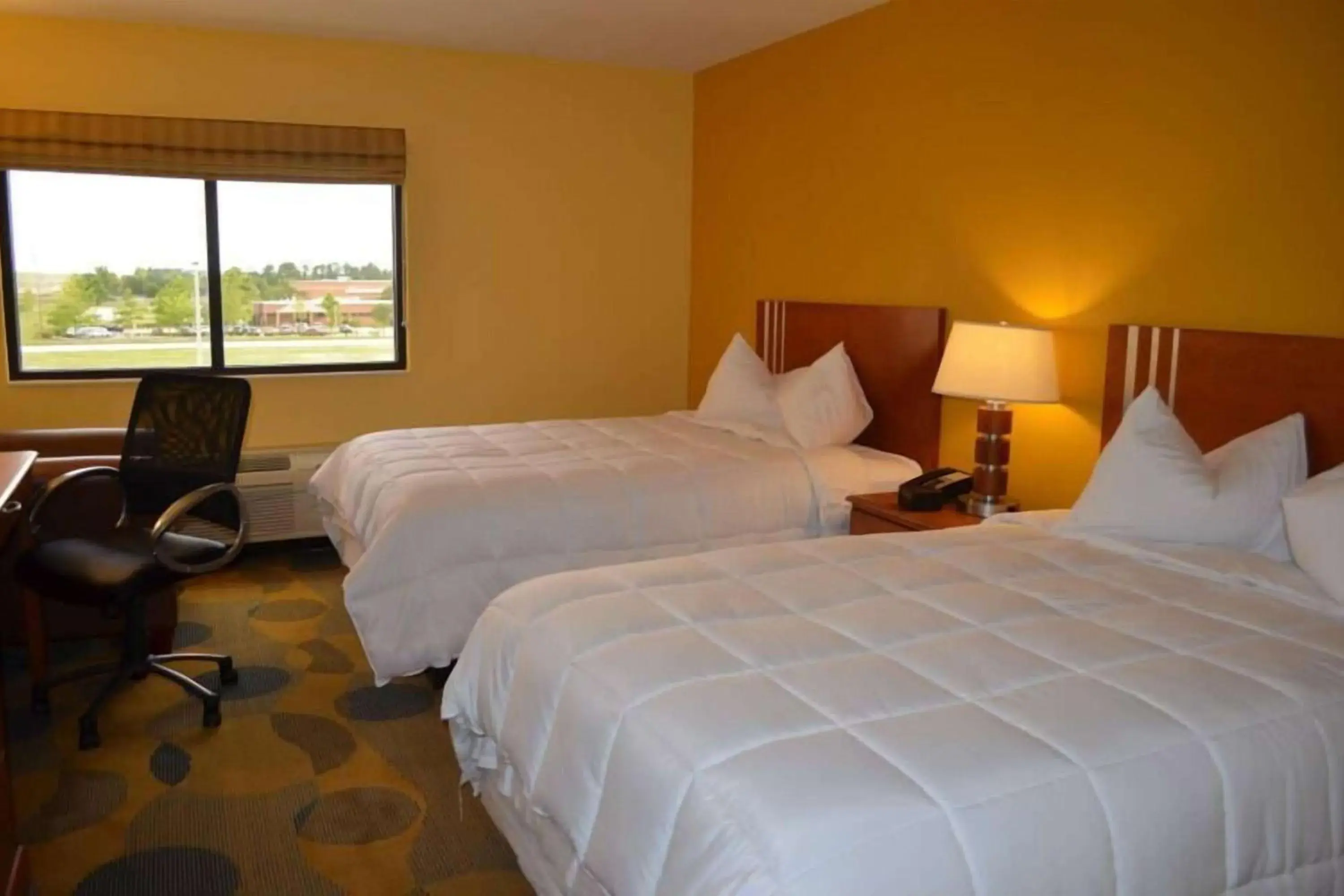 Photo of the whole room, Bed in Marble Waters Hotel & Suites, Trademark by Wyndham