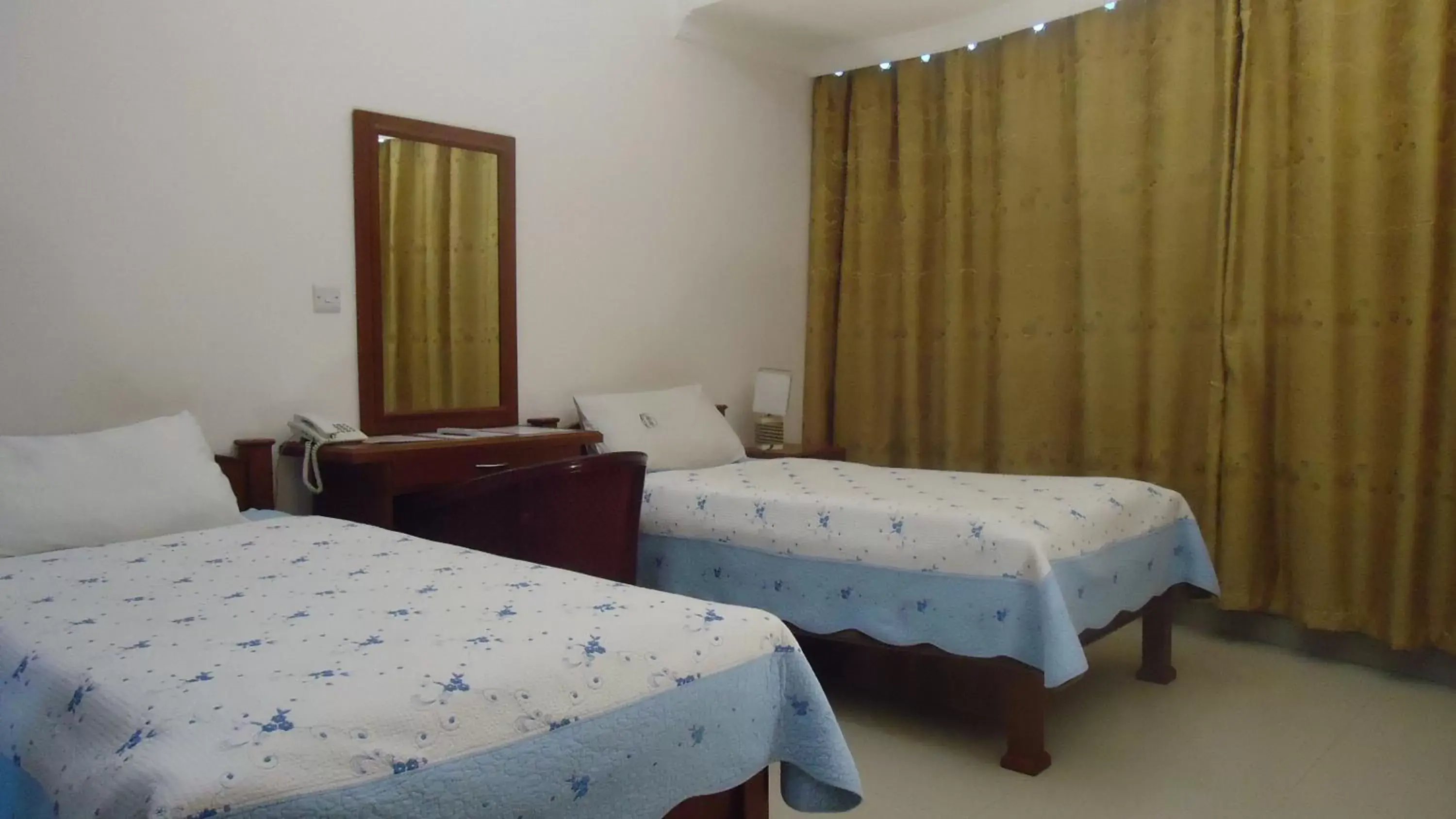 Bed in Rainbow Hotel Bed in Rainbow Hotel