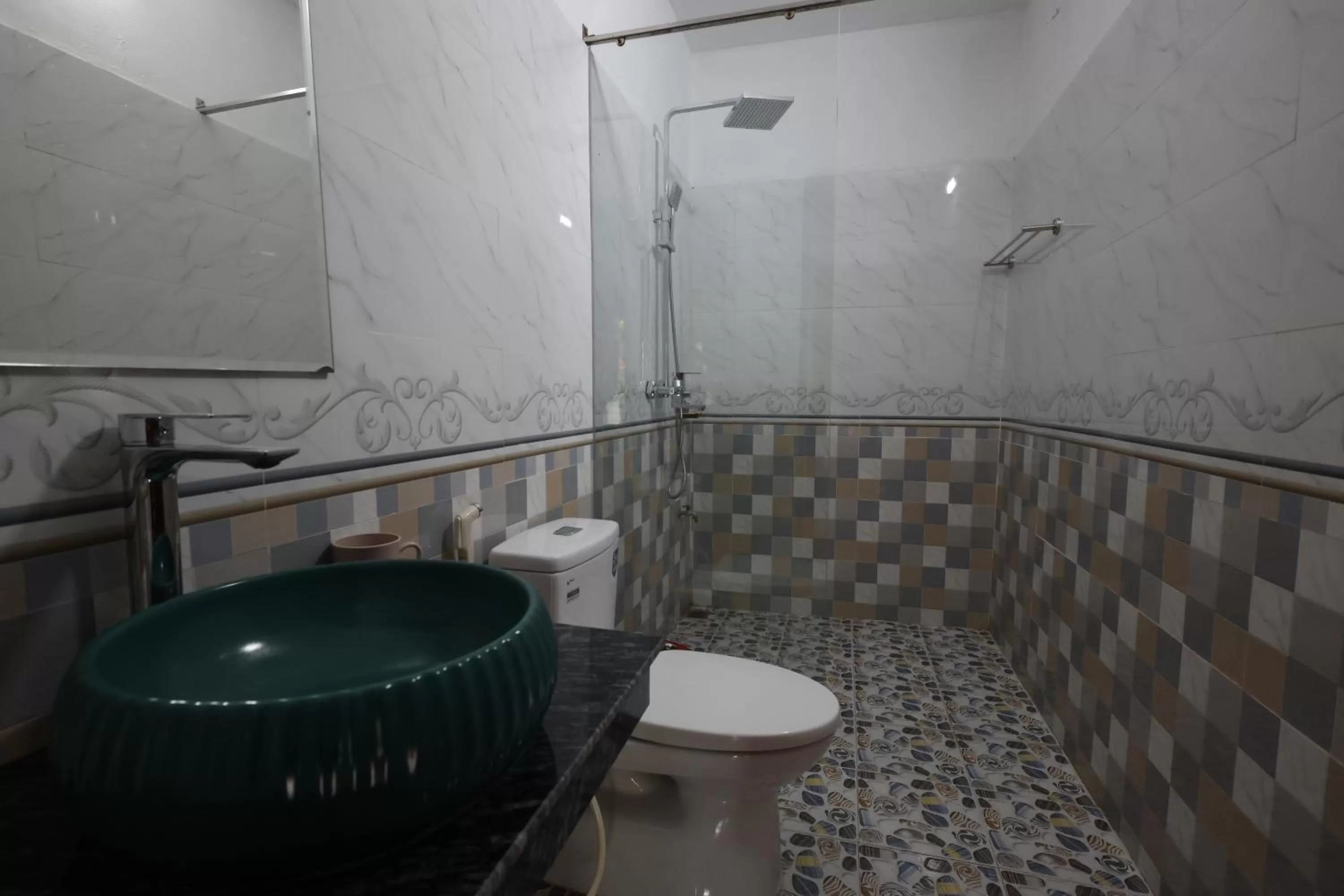 Shower in Phạm Gia Homestay Ecogarden