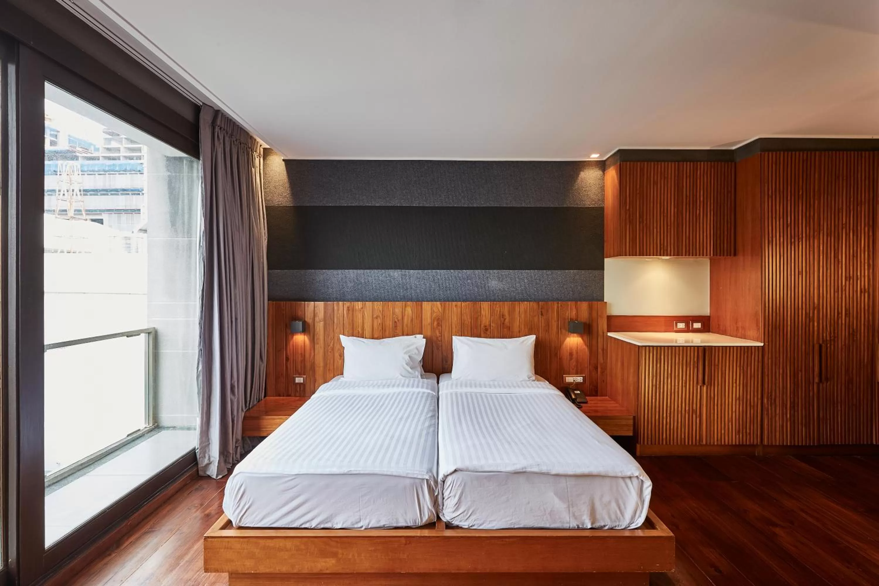 Bed in LUXX Langsuan Hotel - SHA Plus