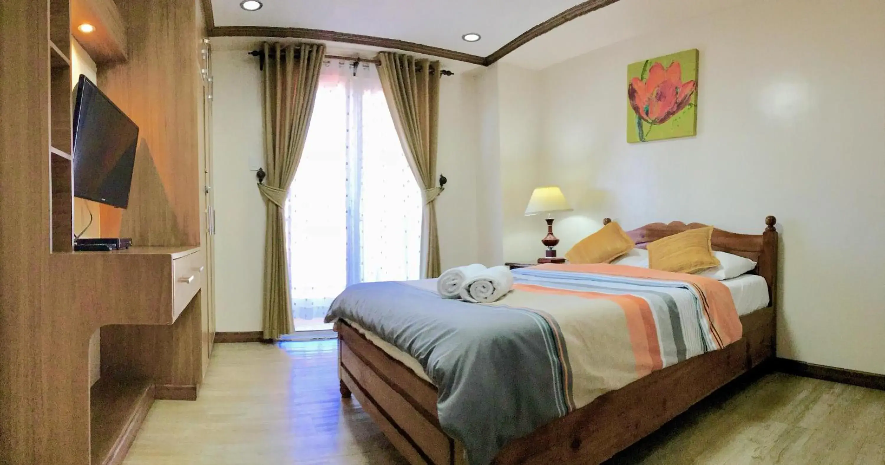Bed in Prestige Vacation Apartments - Bonbel Condominium