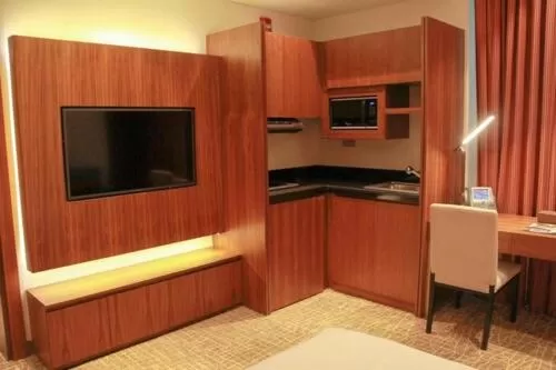 Kitchen or kitchenette in Century Hotel Doha