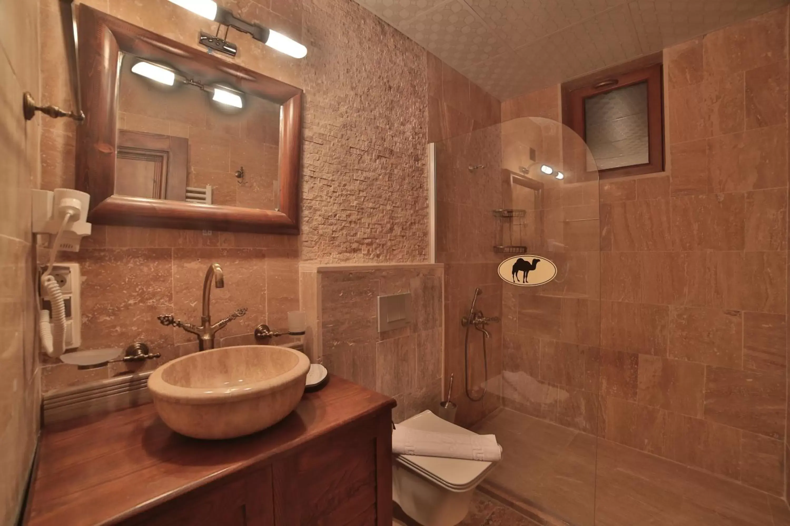 Shower, Bathroom in Caravanserai Inn Hotel