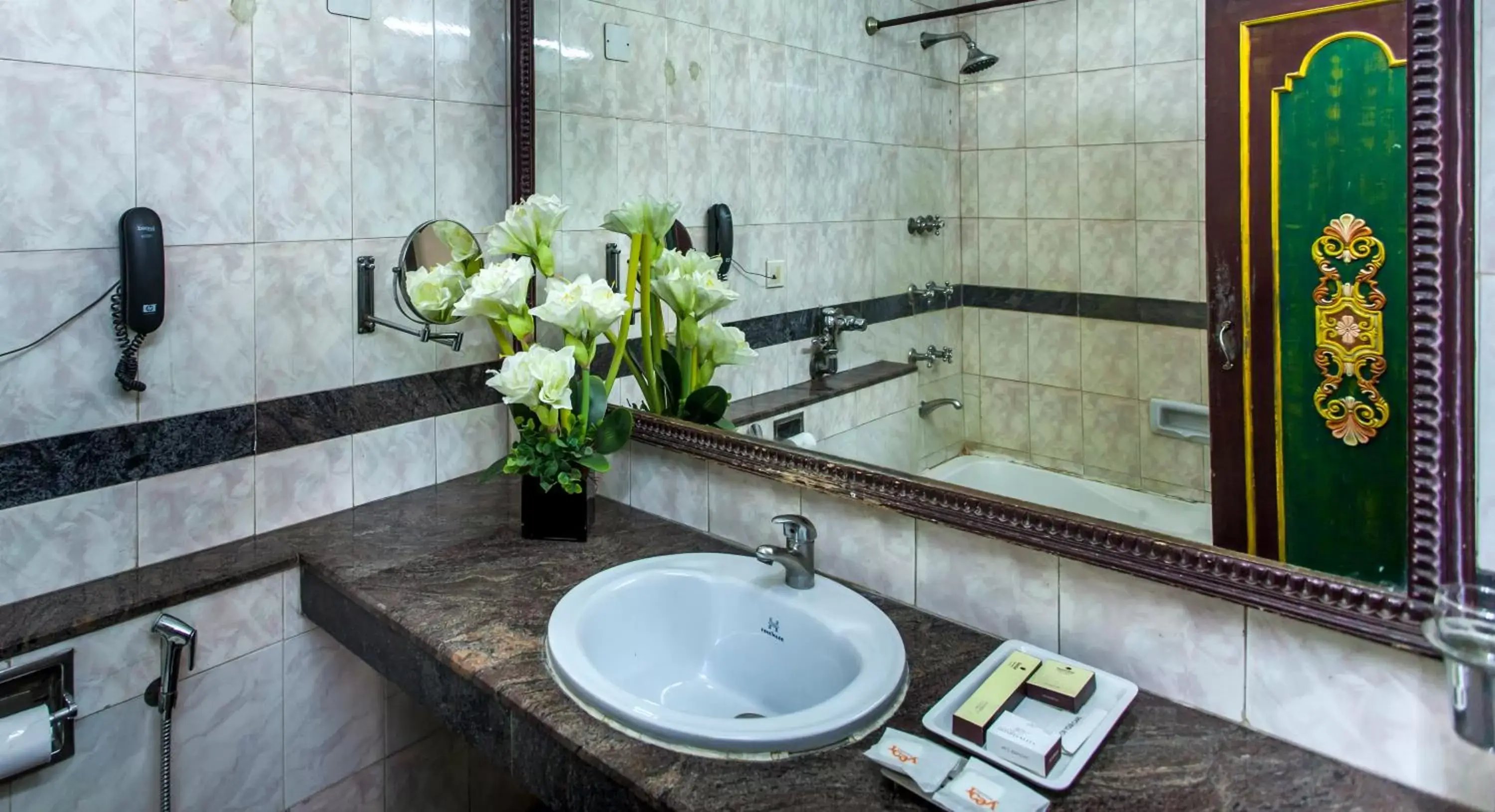 Bathroom in Hotel Sunstar Residency