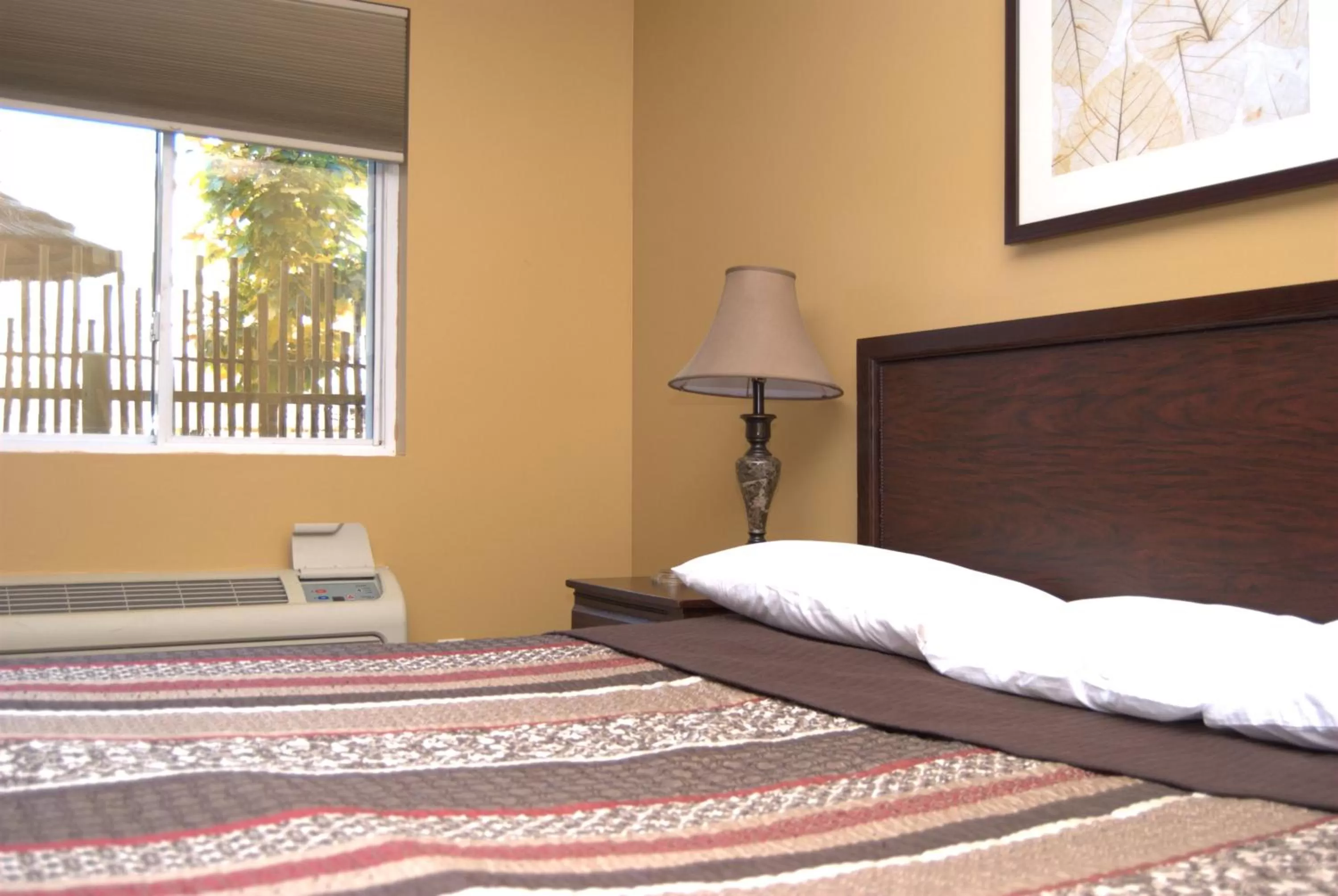 Bed, Room Photo in Commodore Resort