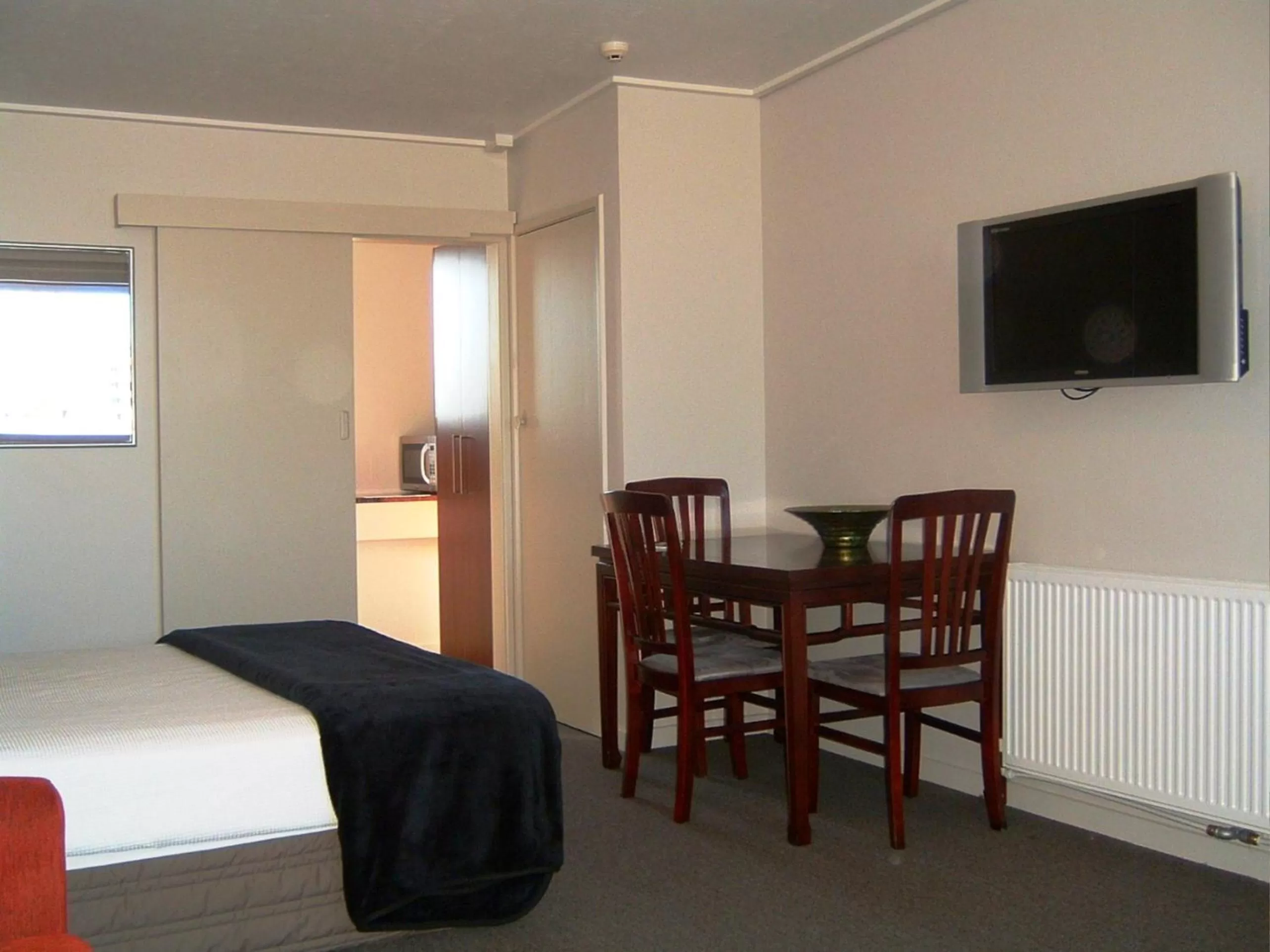 Photo of the whole room, Bed in City Central Motel Apartments