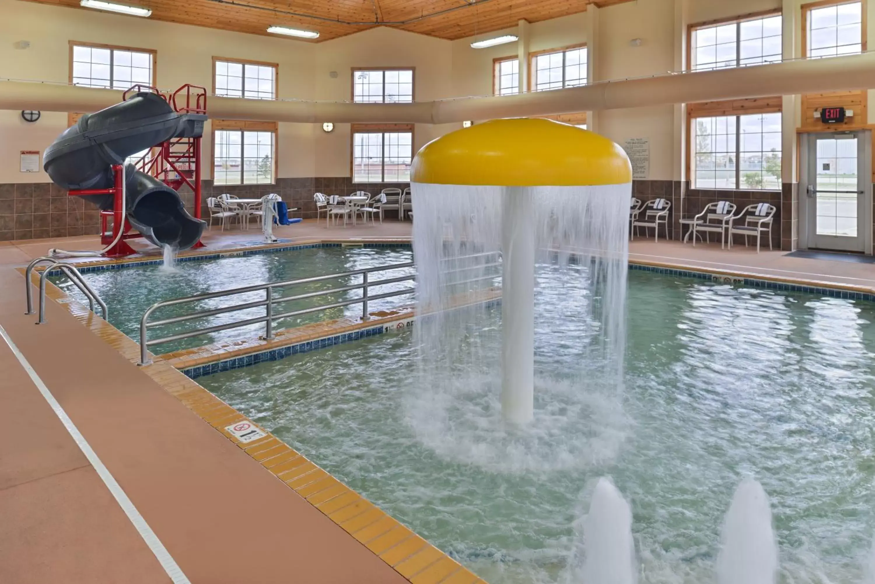 Swimming pool in AmericInn by Wyndham Fargo Medical Center