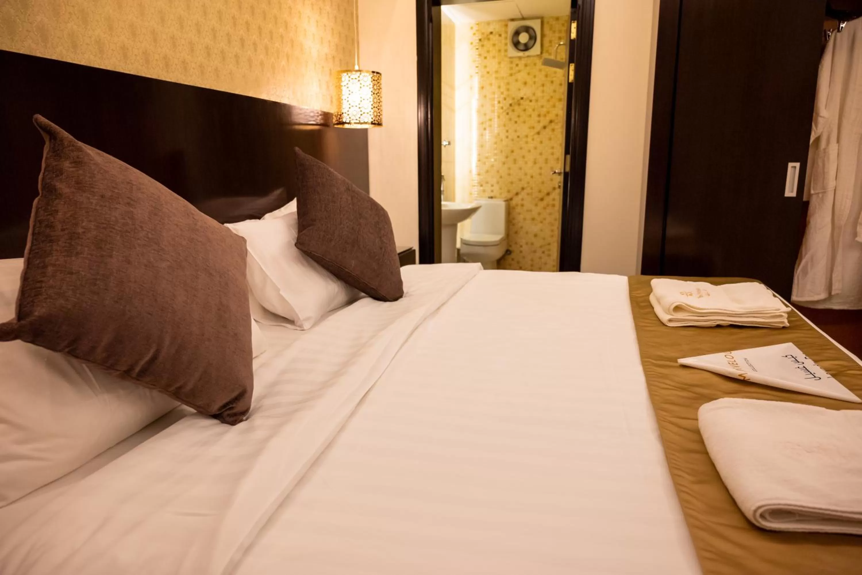 Bed in The Artisan Hotel-Suits