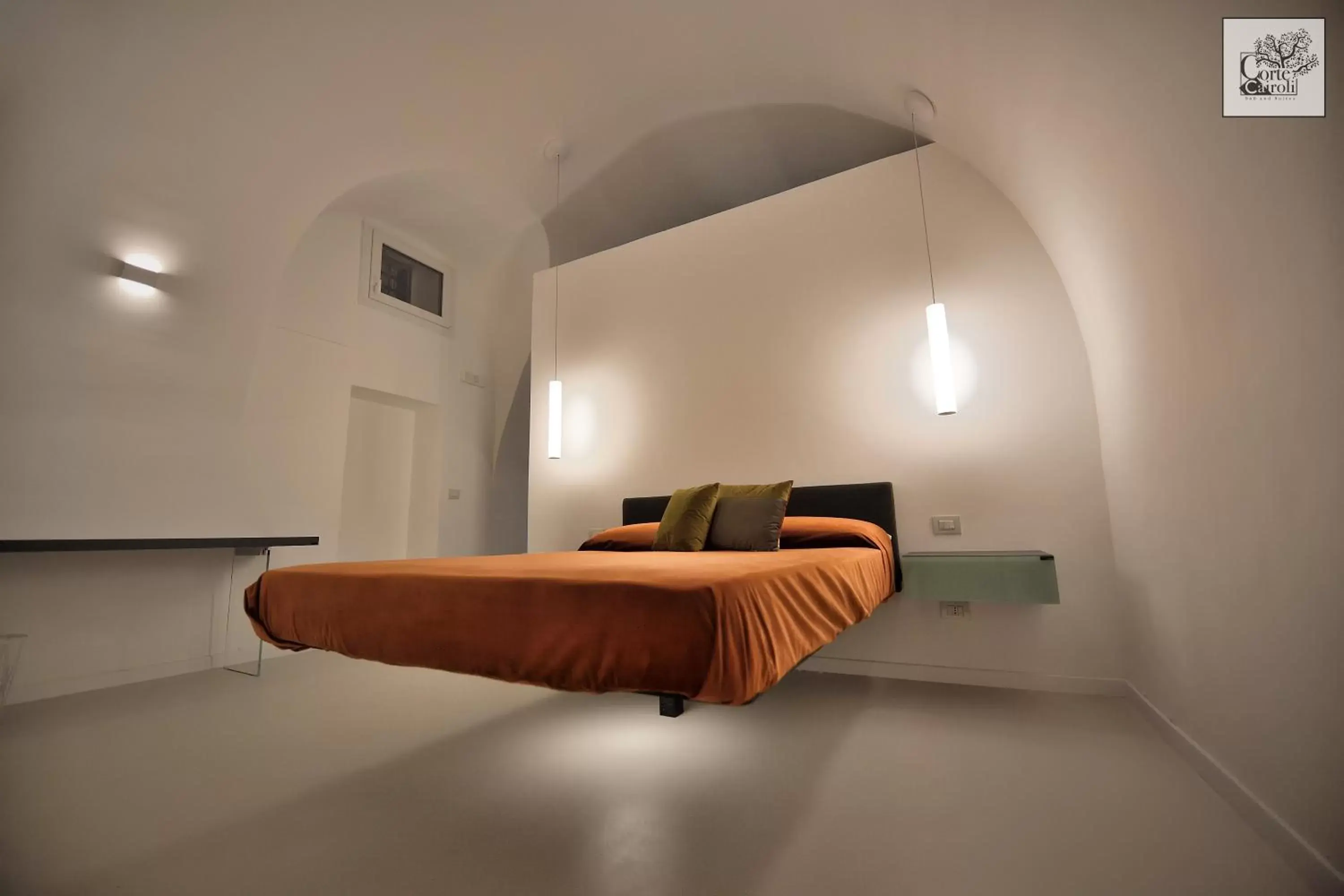 Bed in Corte Cairoli B&B and Suites
