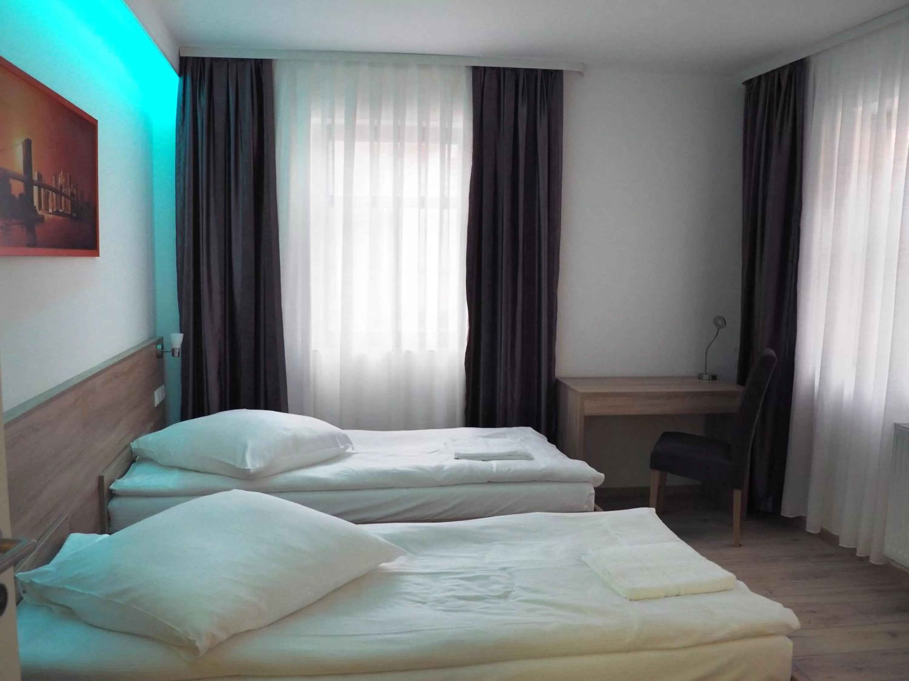 Photo of the whole room, Bed in Pension Villa Colosseo im Herzen von Meiningen