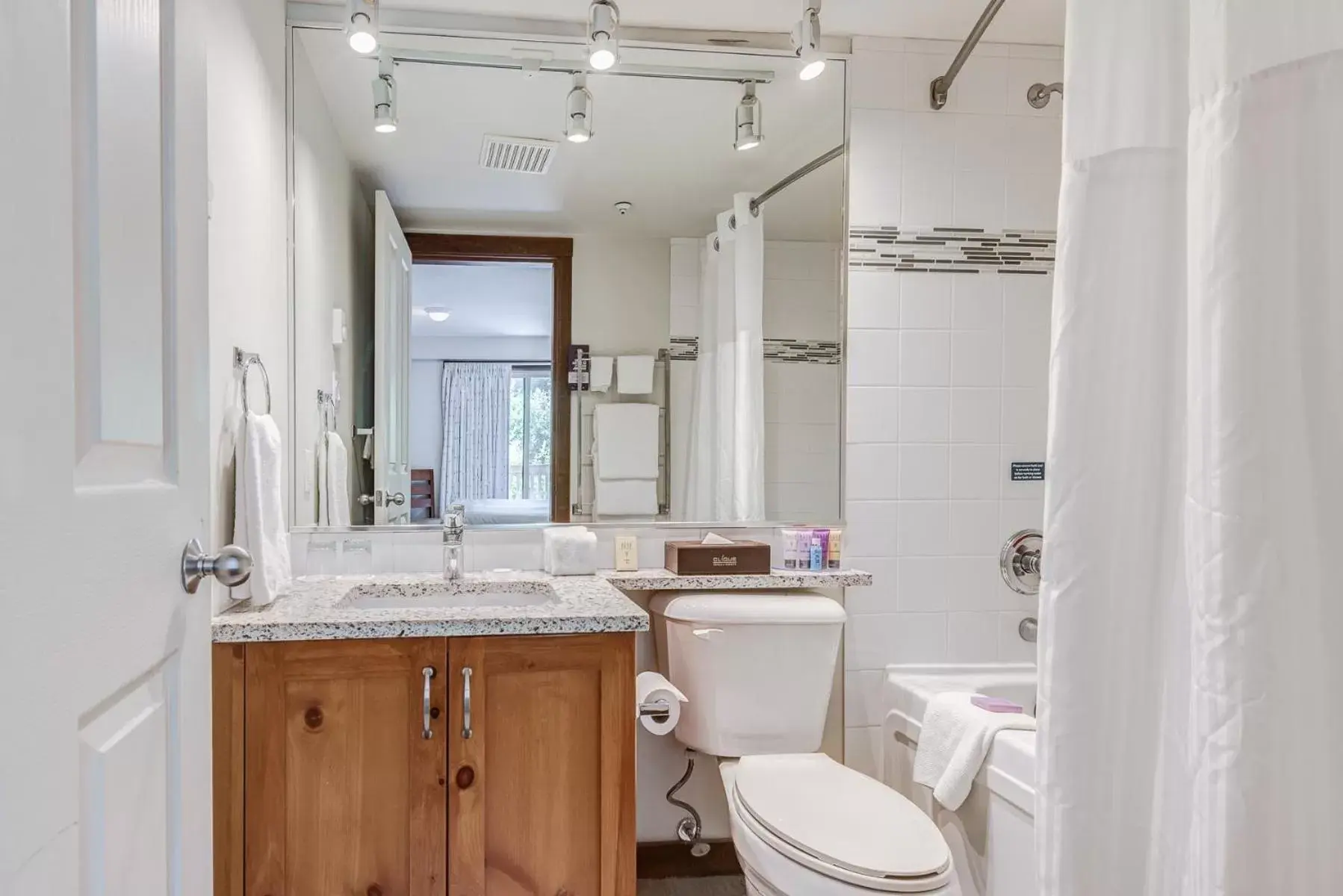 Shower, Bathroom in Blackcomb Springs Suites by CLIQUE