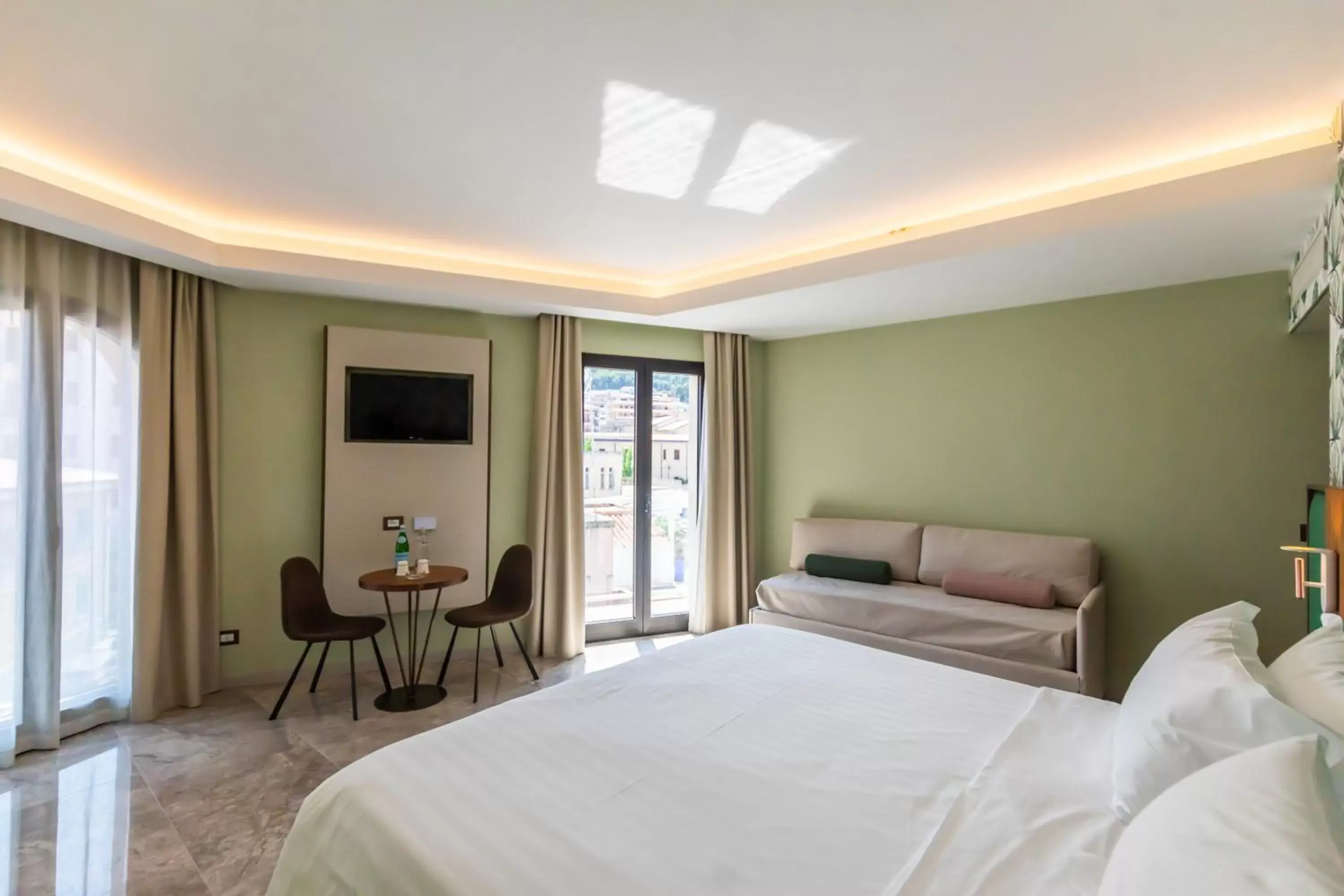 Bed in Solmaris Tropea Rooms & Suites