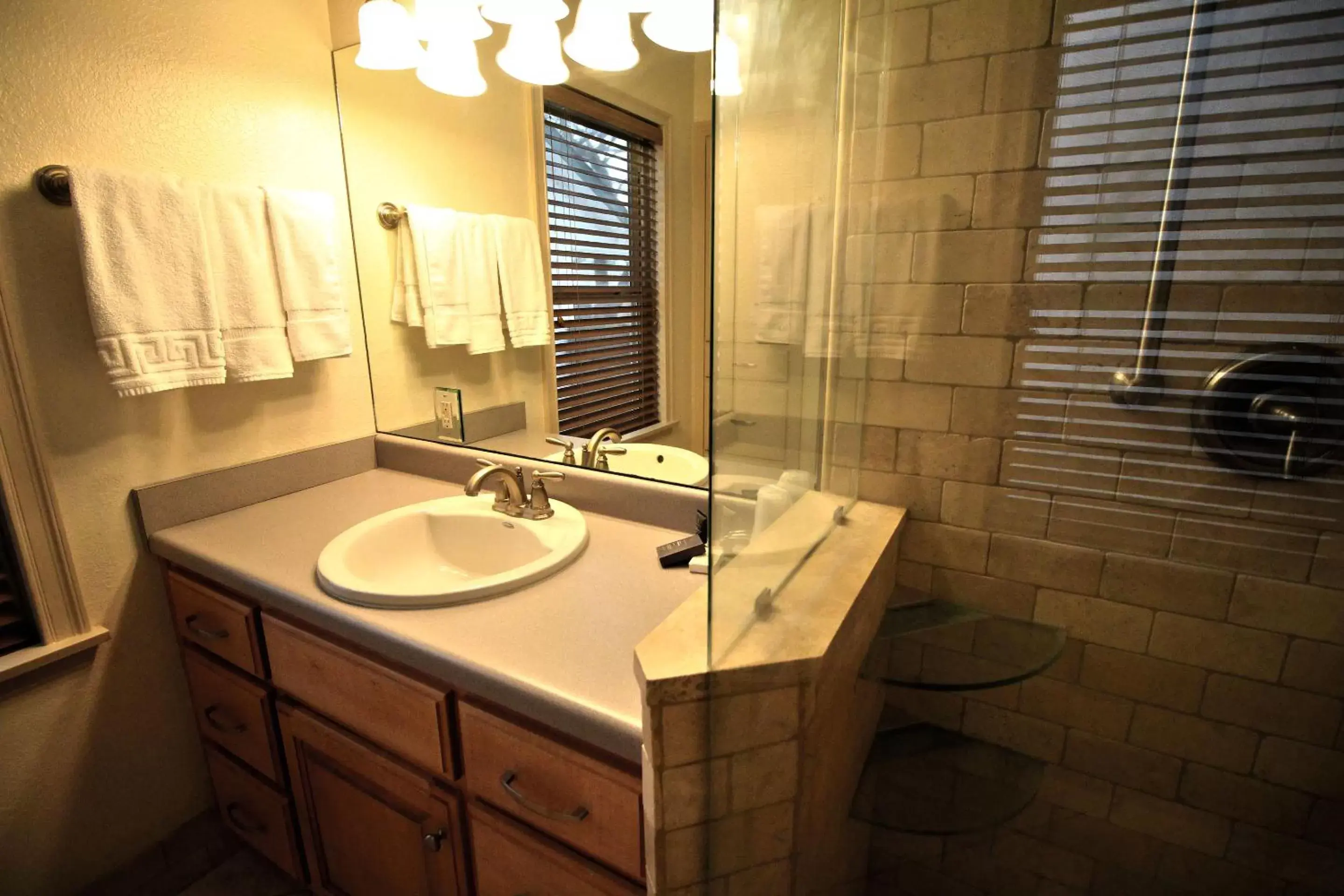 Bathroom in Peach Tree Inn & Suites