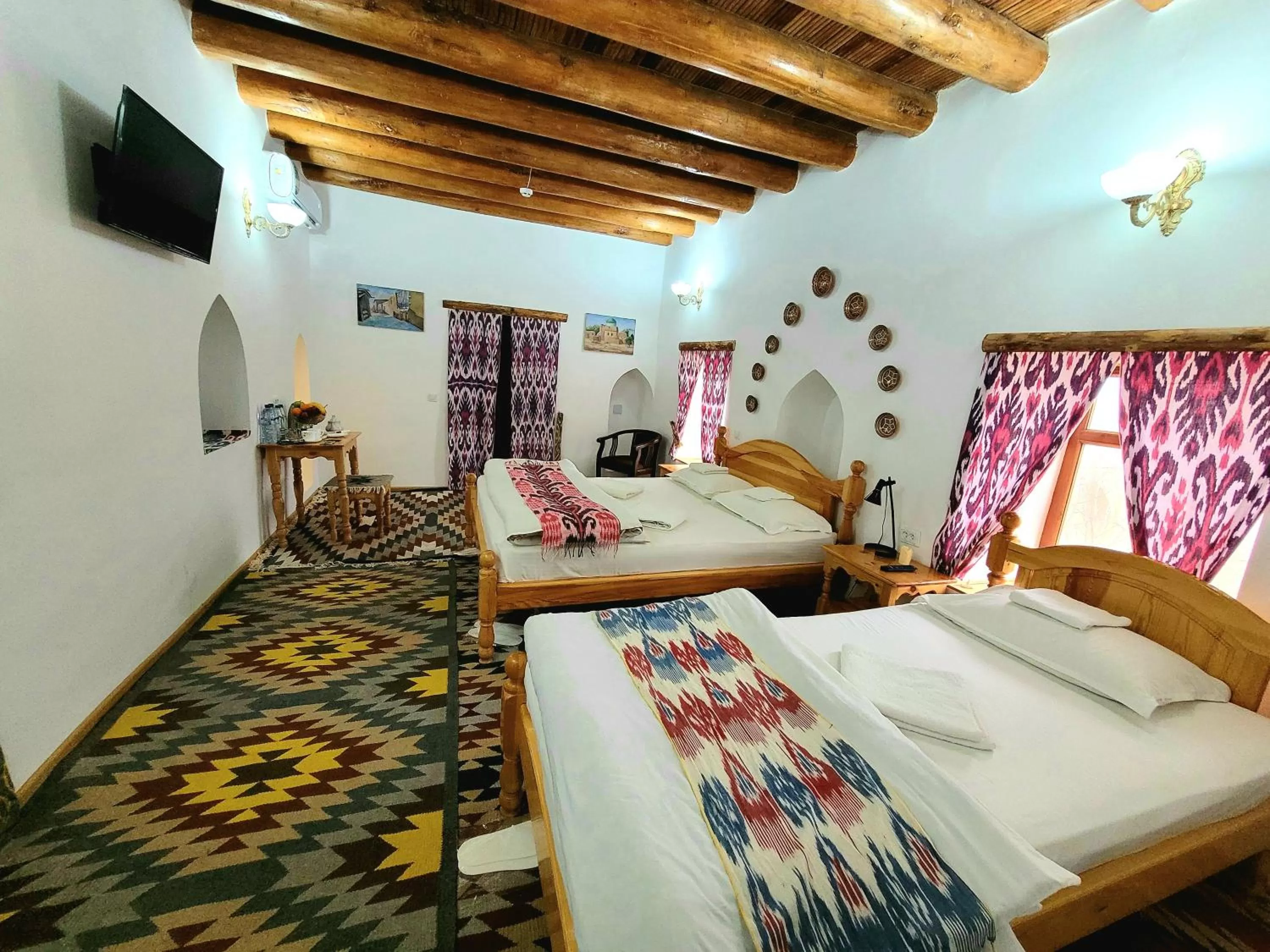 Bed in madrasah Polvon-Qori boutique hotel XIX century