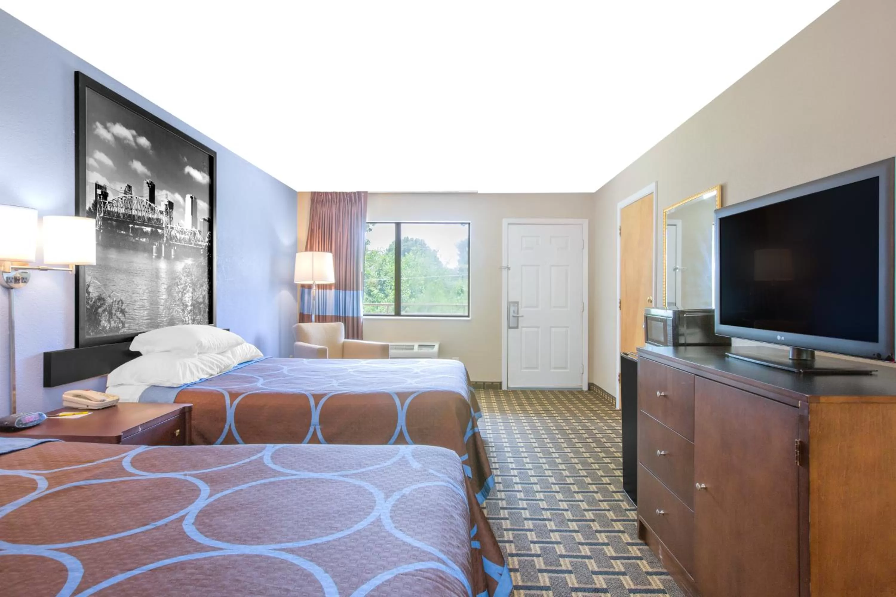 Photo of the whole room, Bed in Super 8 by Wyndham Brinkley