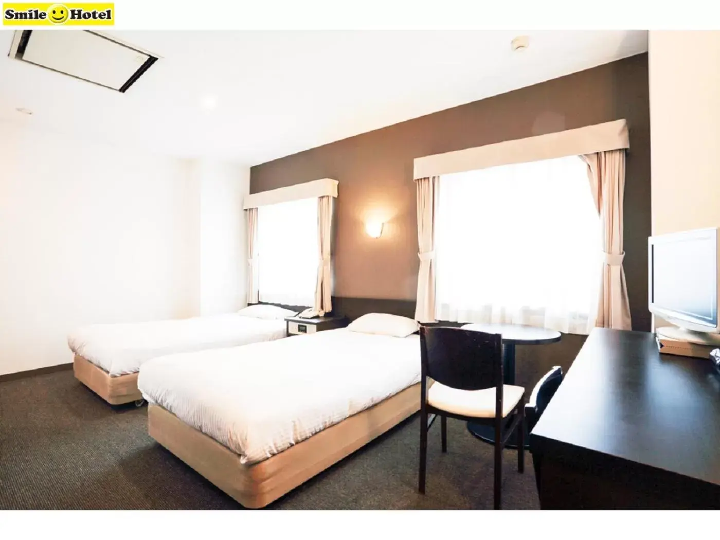 Photo of the whole room, Bed in Smile Hotel Asahikawa