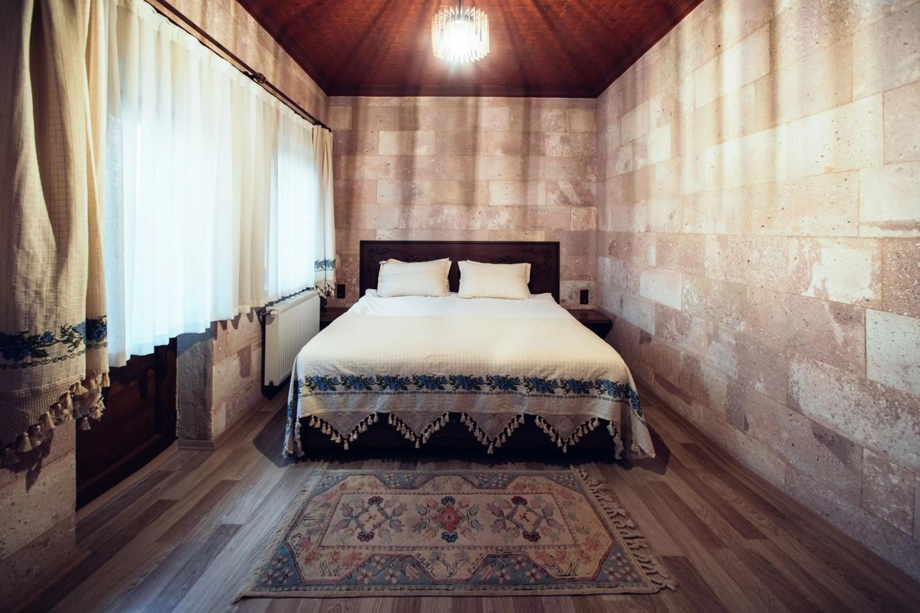 Bed in Azalea Terrace Cave Hotel