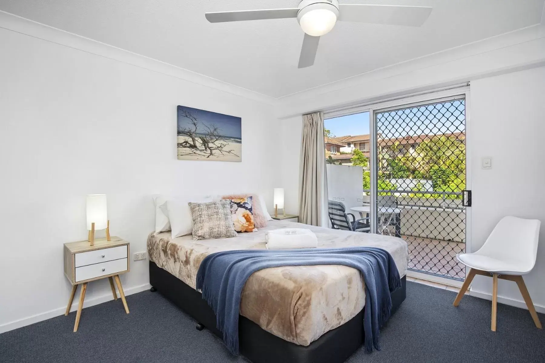 Bed in Kirra Palms Holiday Apartments