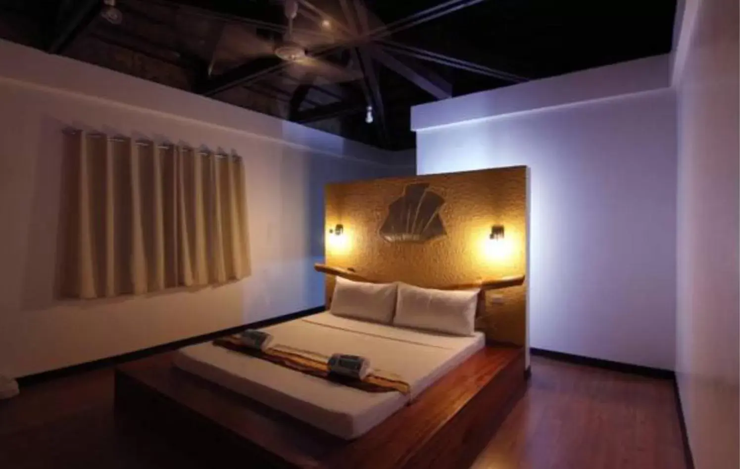 Bed, Seating Area in La Natura Resort