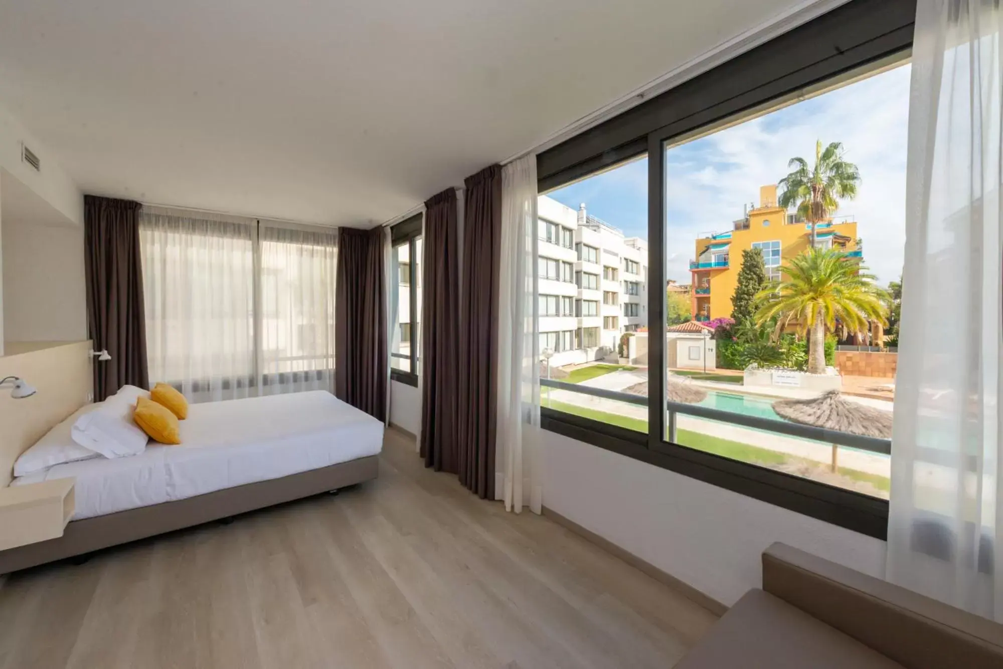 Pool view, Bed in Atenea Park Suites & Apartments Pool view, Bed in Atenea Park Suites & Apartments