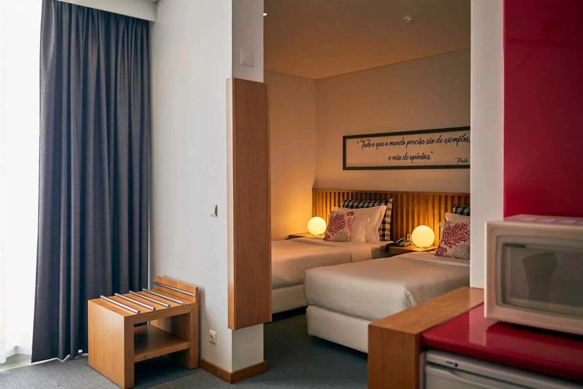 Bed in Hotel Praia Marina by RIDAN Hotels Bed in Hotel Praia Marina by RIDAN Hotels