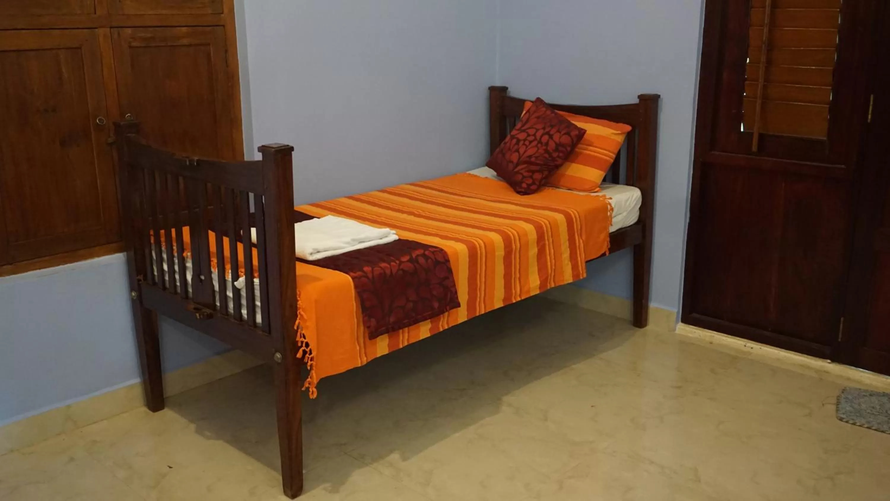Bed in Green's Guest House