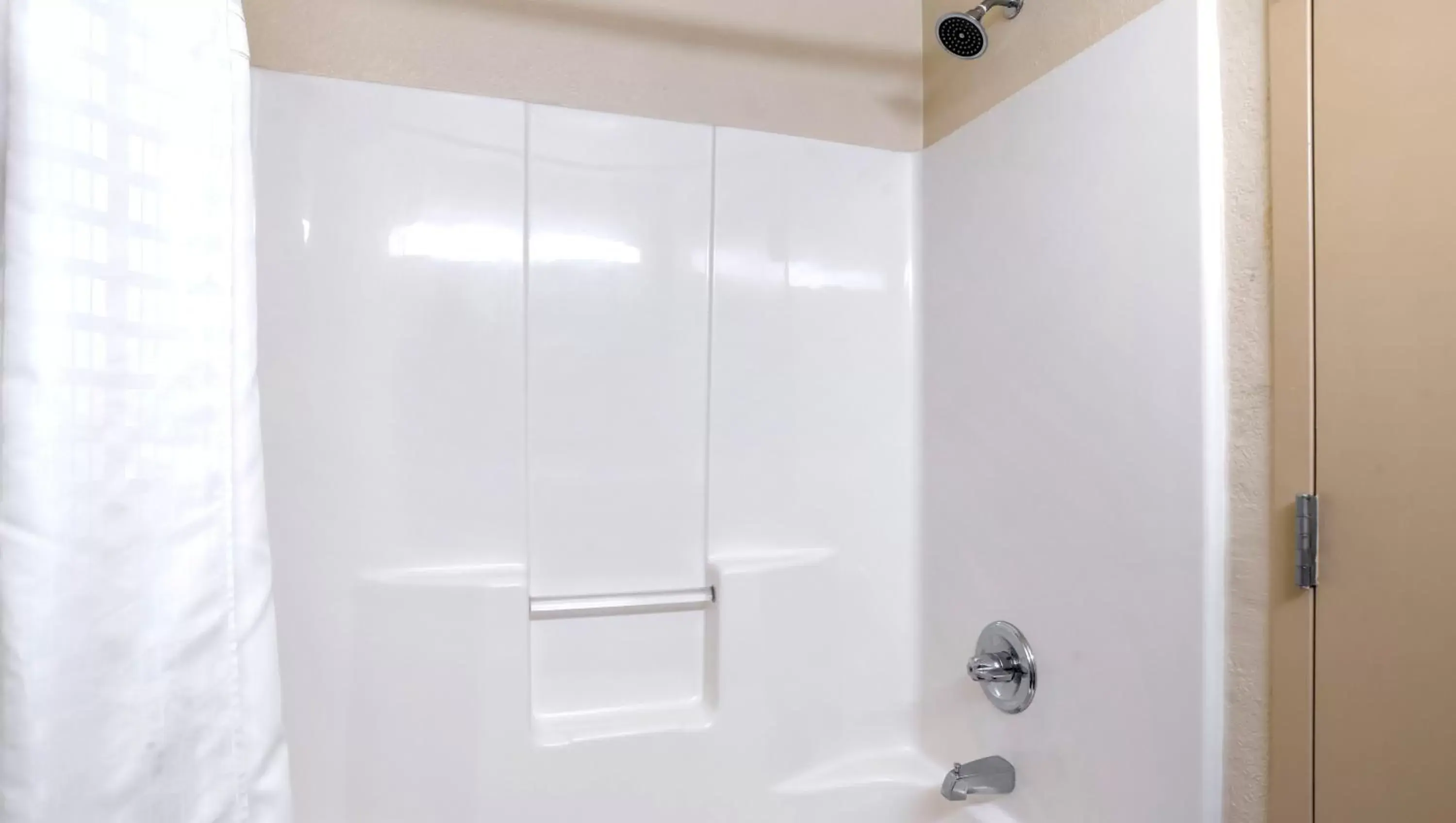 Bathroom in Home 1 Suites Extended Stay