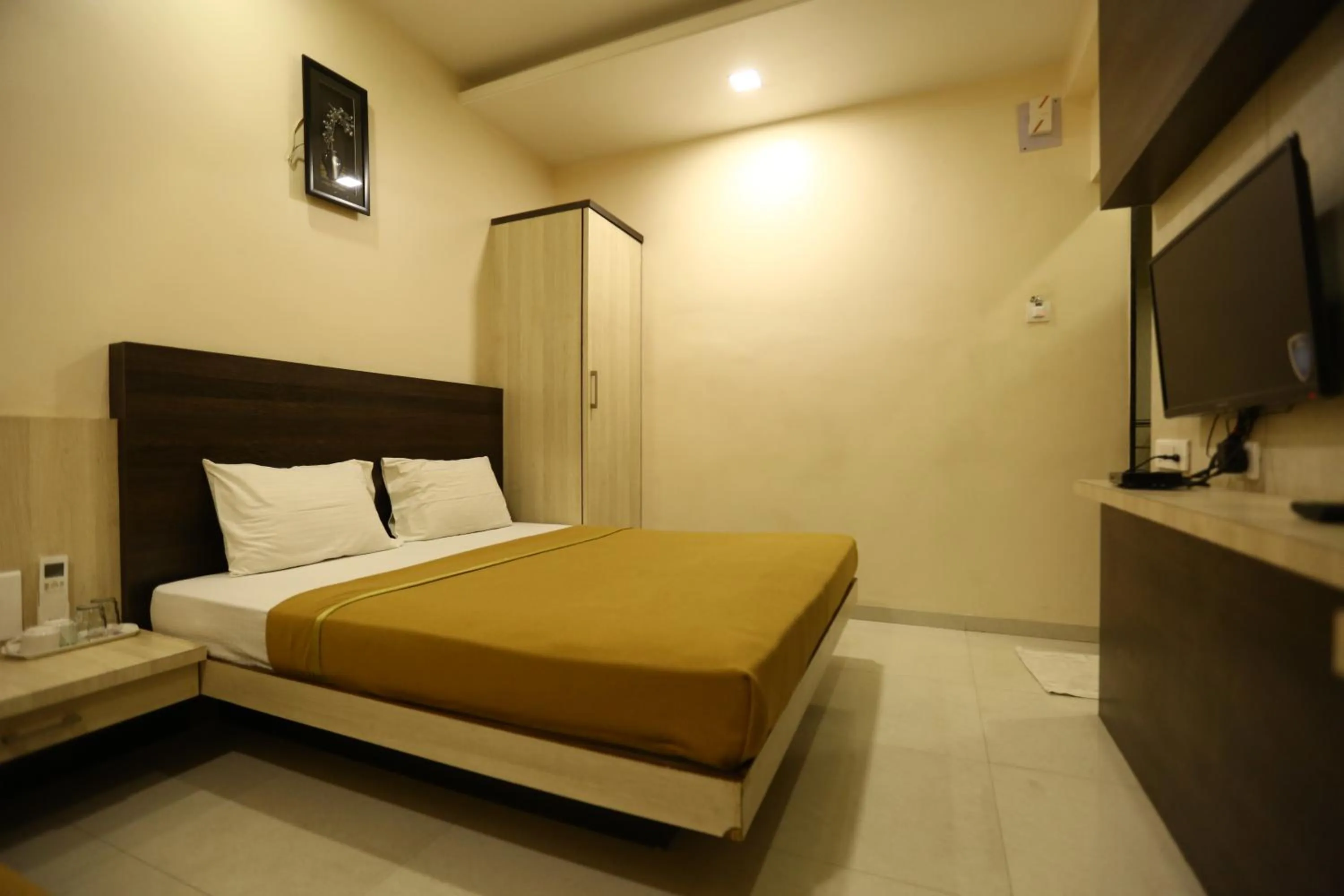 Bed in Hotel Madhuri Executive