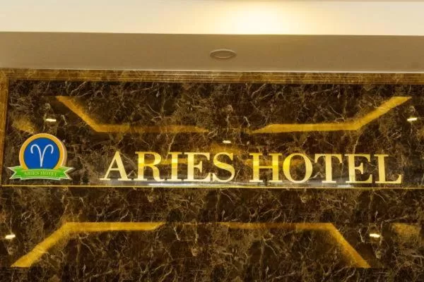 Property Logo/Sign in Aries Hotel