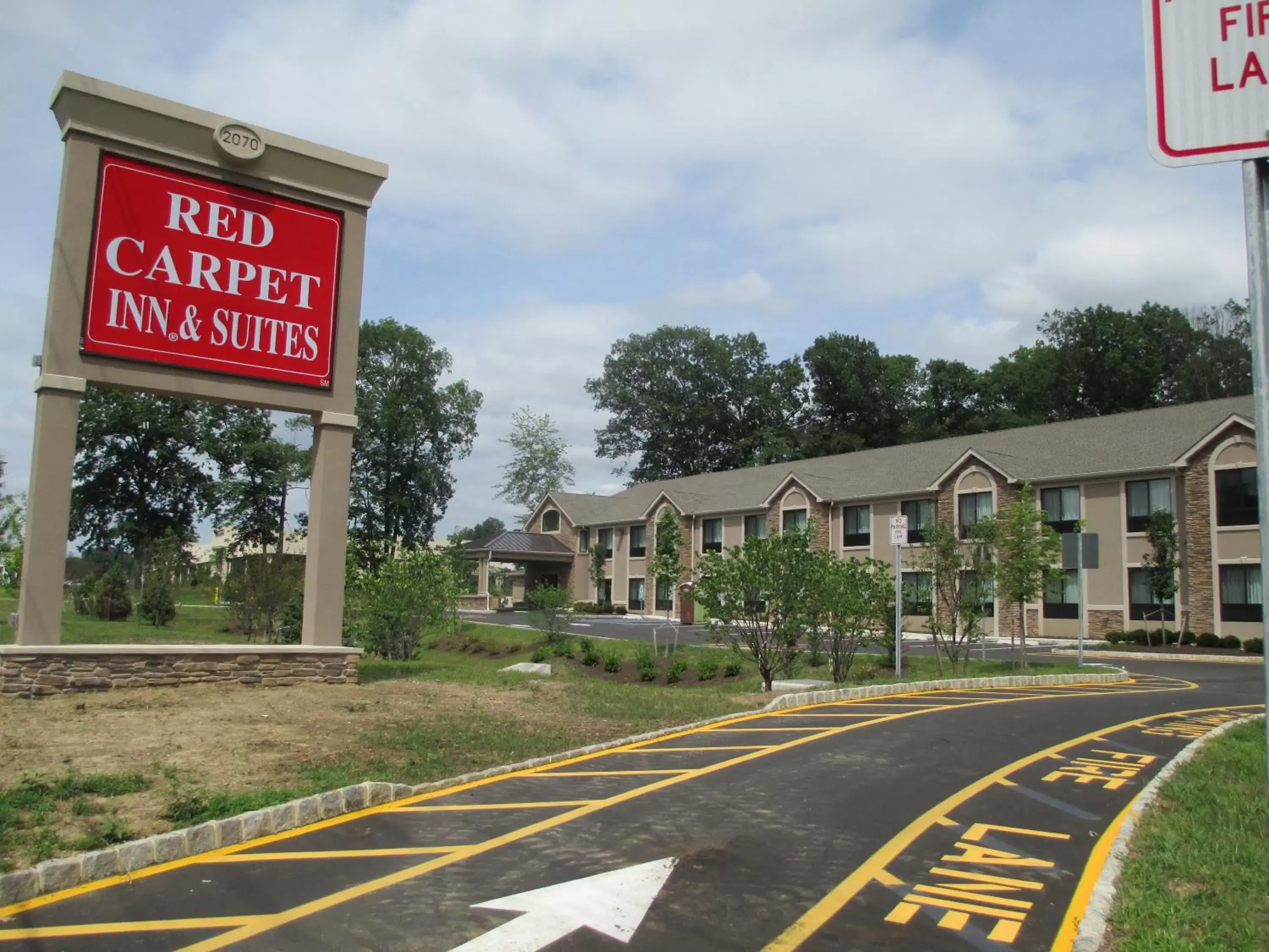 Day, Property Building in Red Carpet Inn and Suites Monmouth Junction