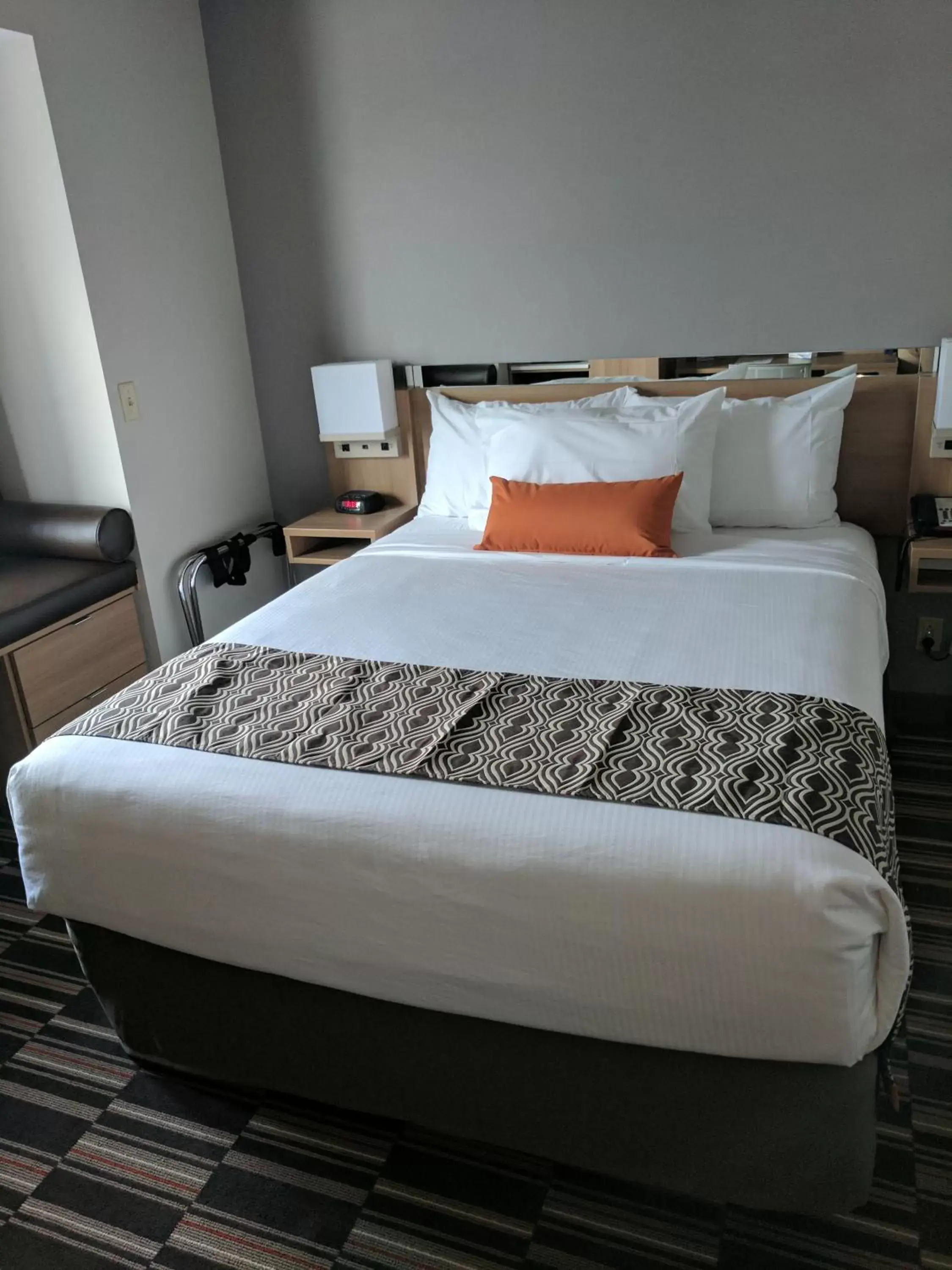 Bed in Microtel Inn & Suites by Wyndham Clarion