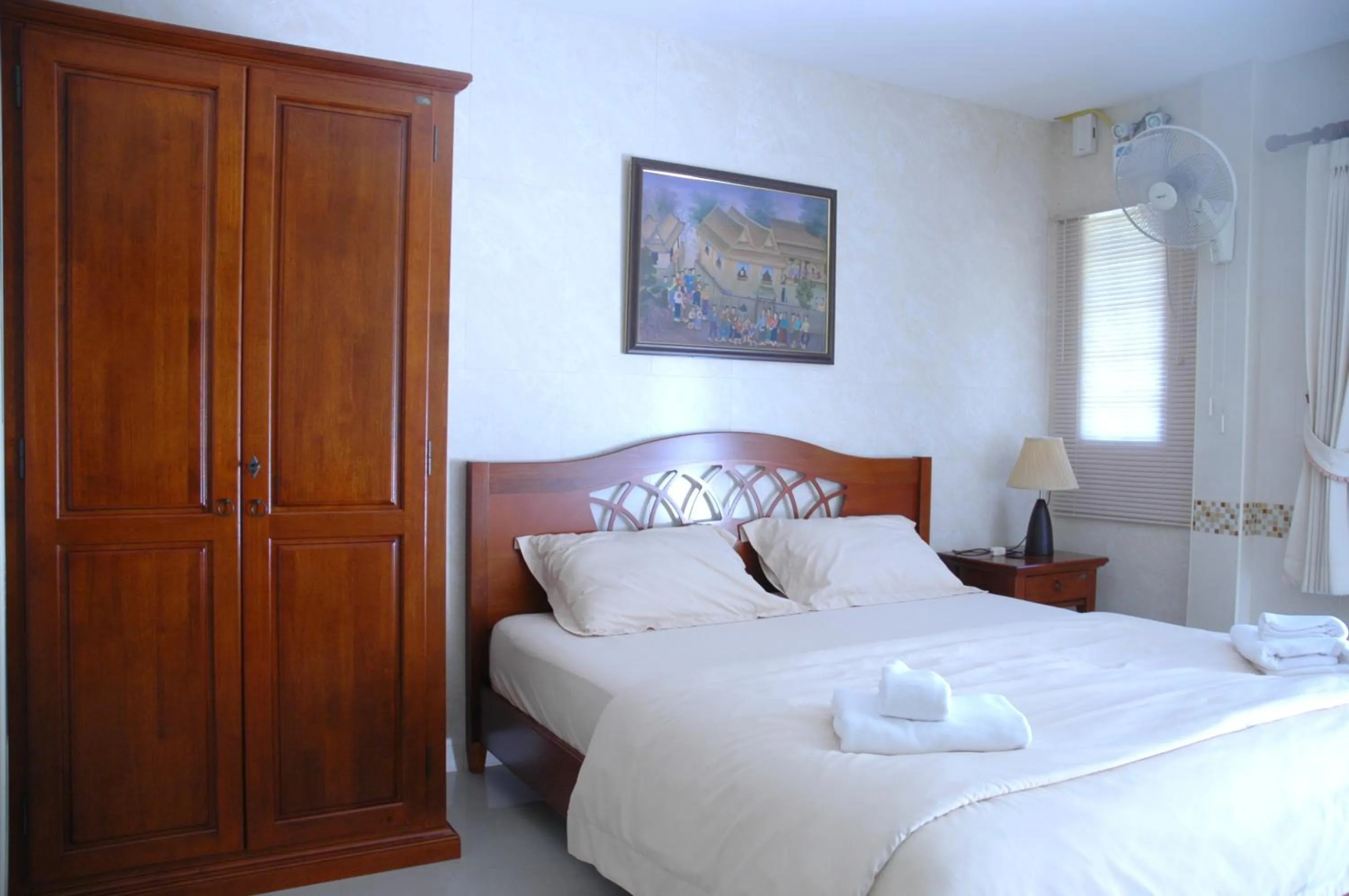 Bed in Thararin Villa