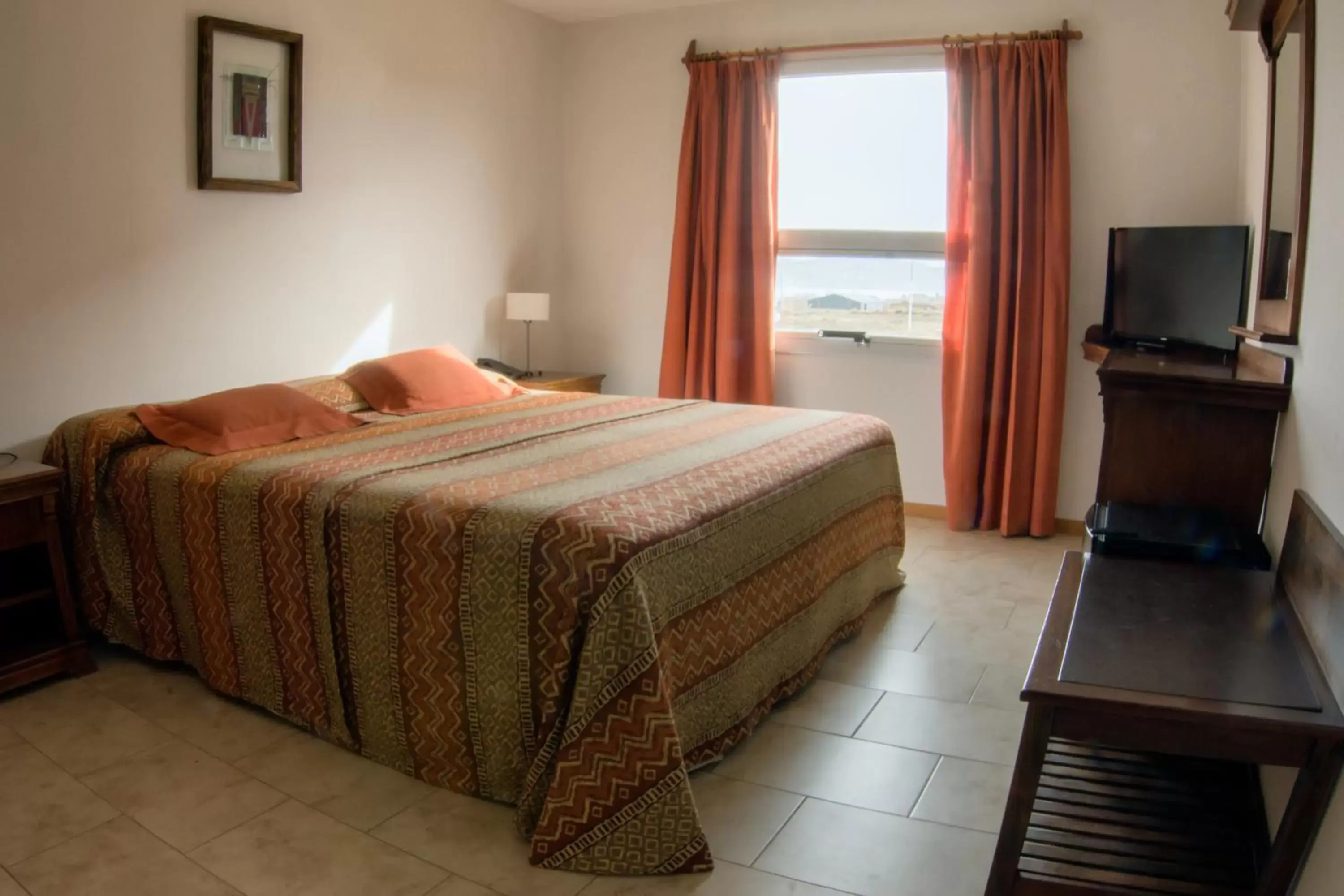 Bedroom, Bed in Tierra Tehuelche Hostería y Aparts