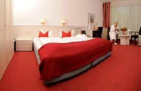 Photo of the whole room, Bed in Euro Park Hotel Hennef