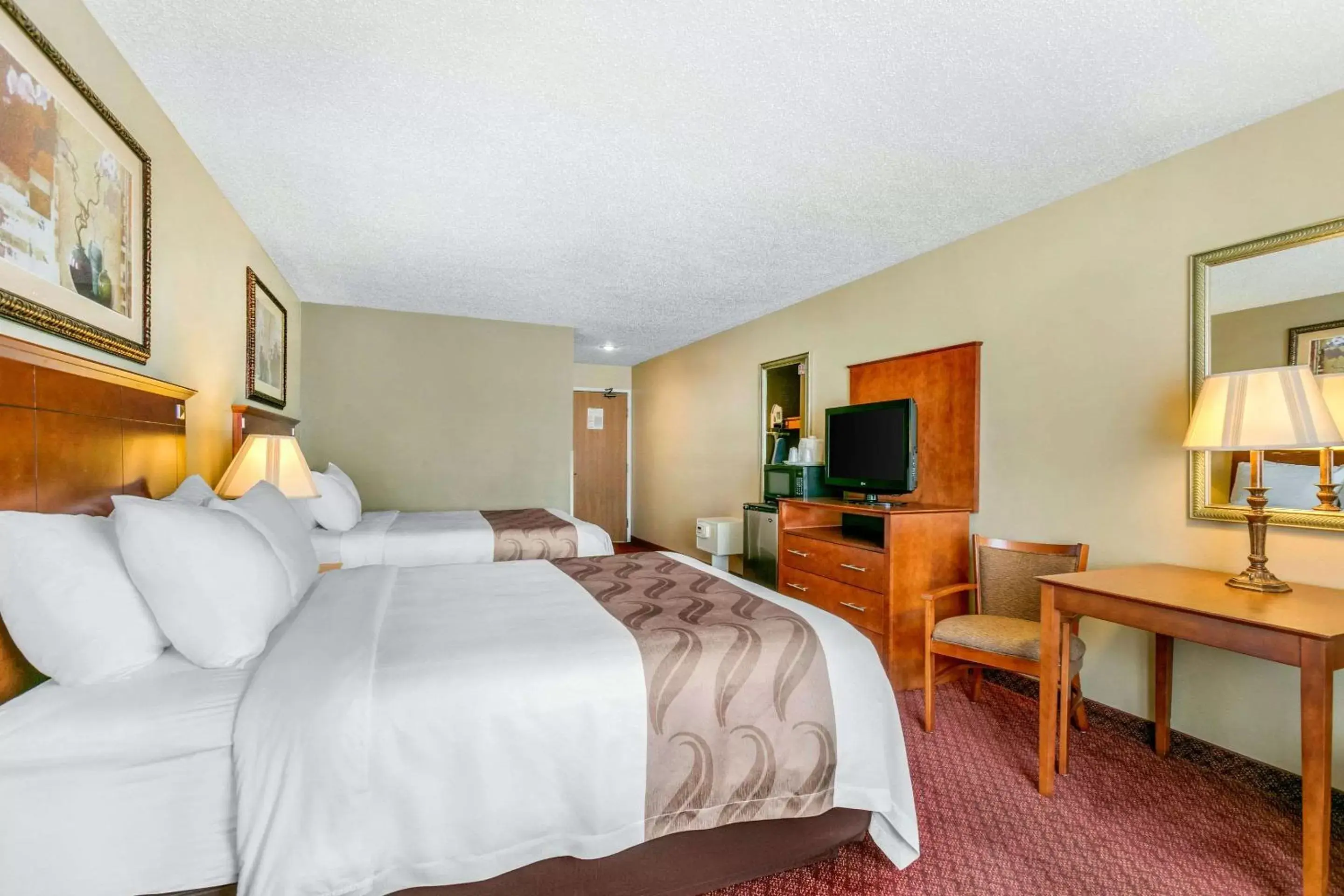 Photo of the whole room, Bed in Quality Inn near Monument Health Rapid City Hospital