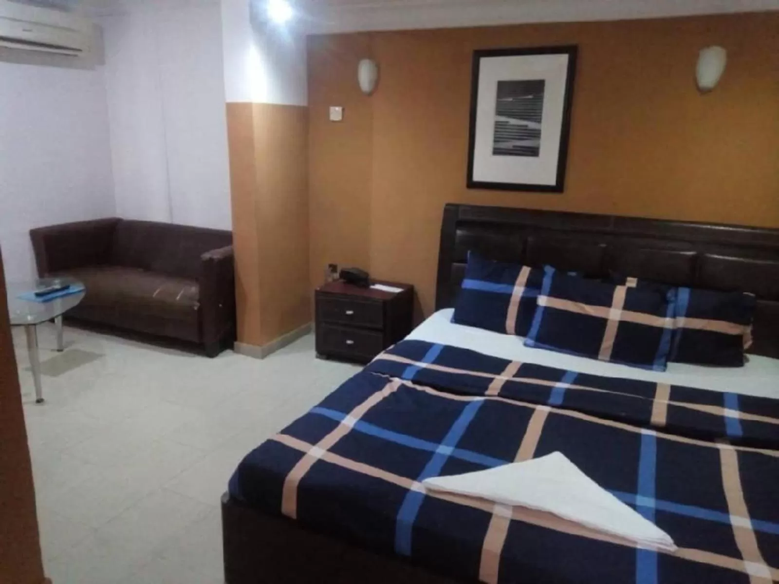 Bed in TheoDawn Hotels @ Suite 29