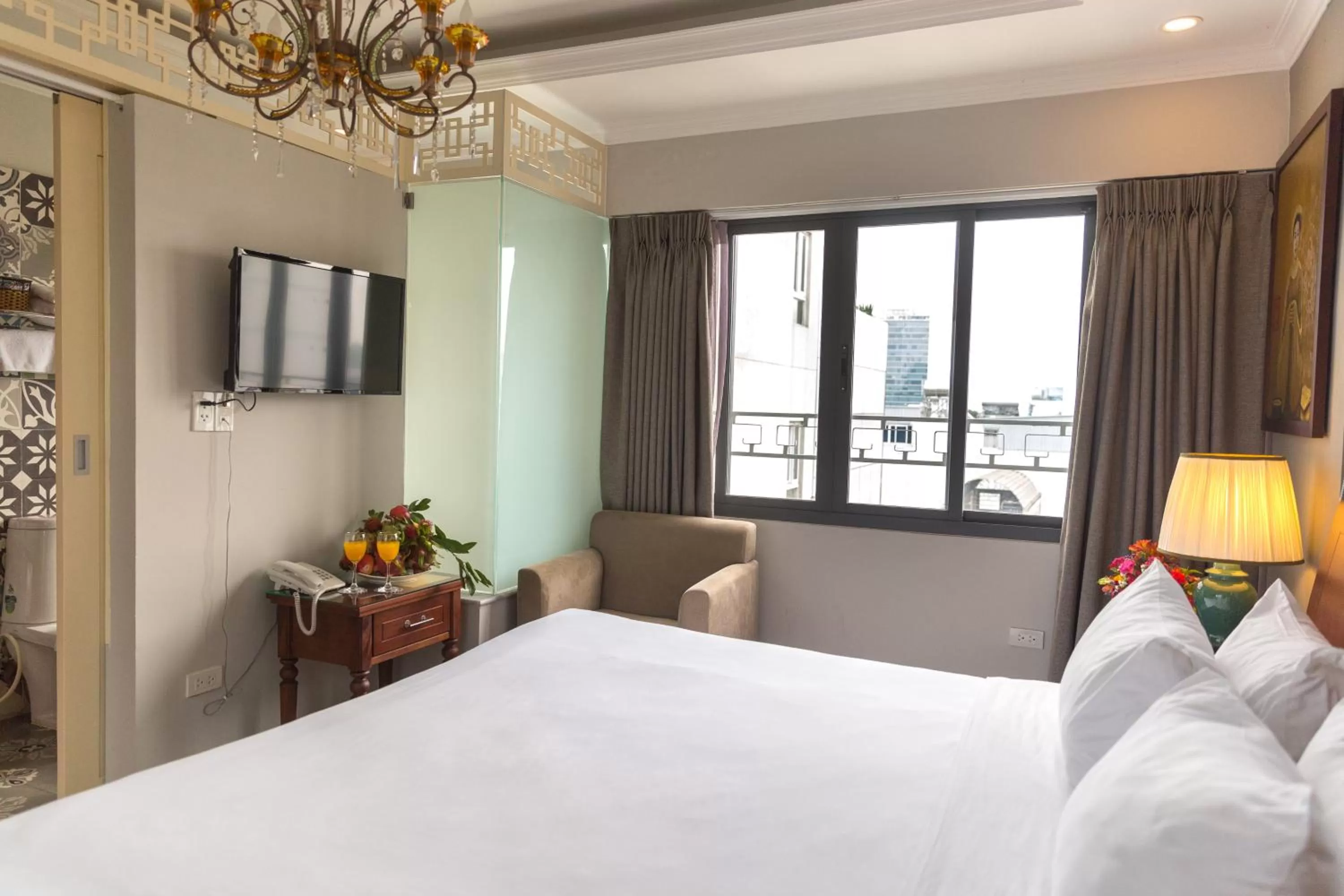 Photo of the whole room, Bed in Ben Thanh Boutique Hotel