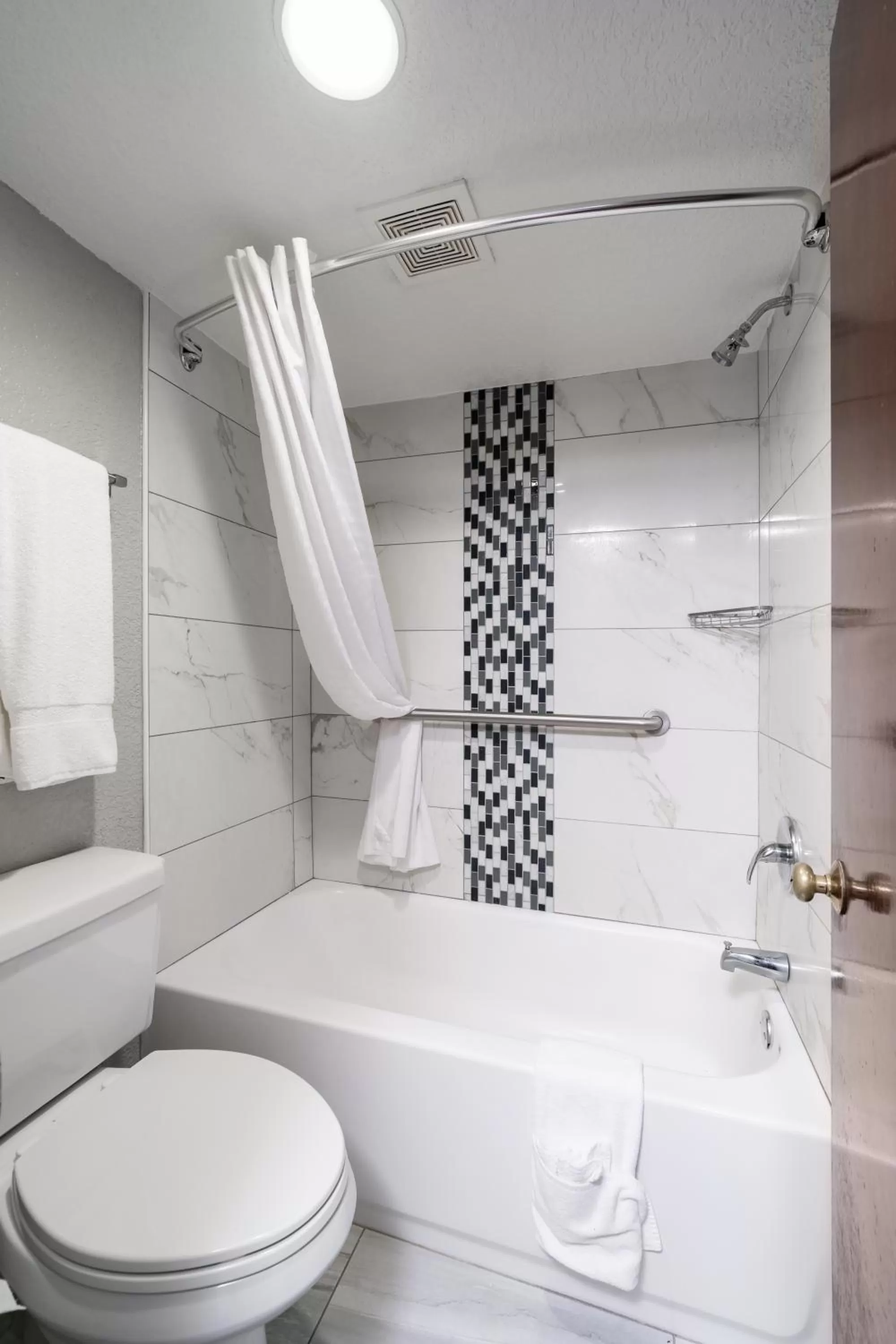 Toilet in GatorTown Inn