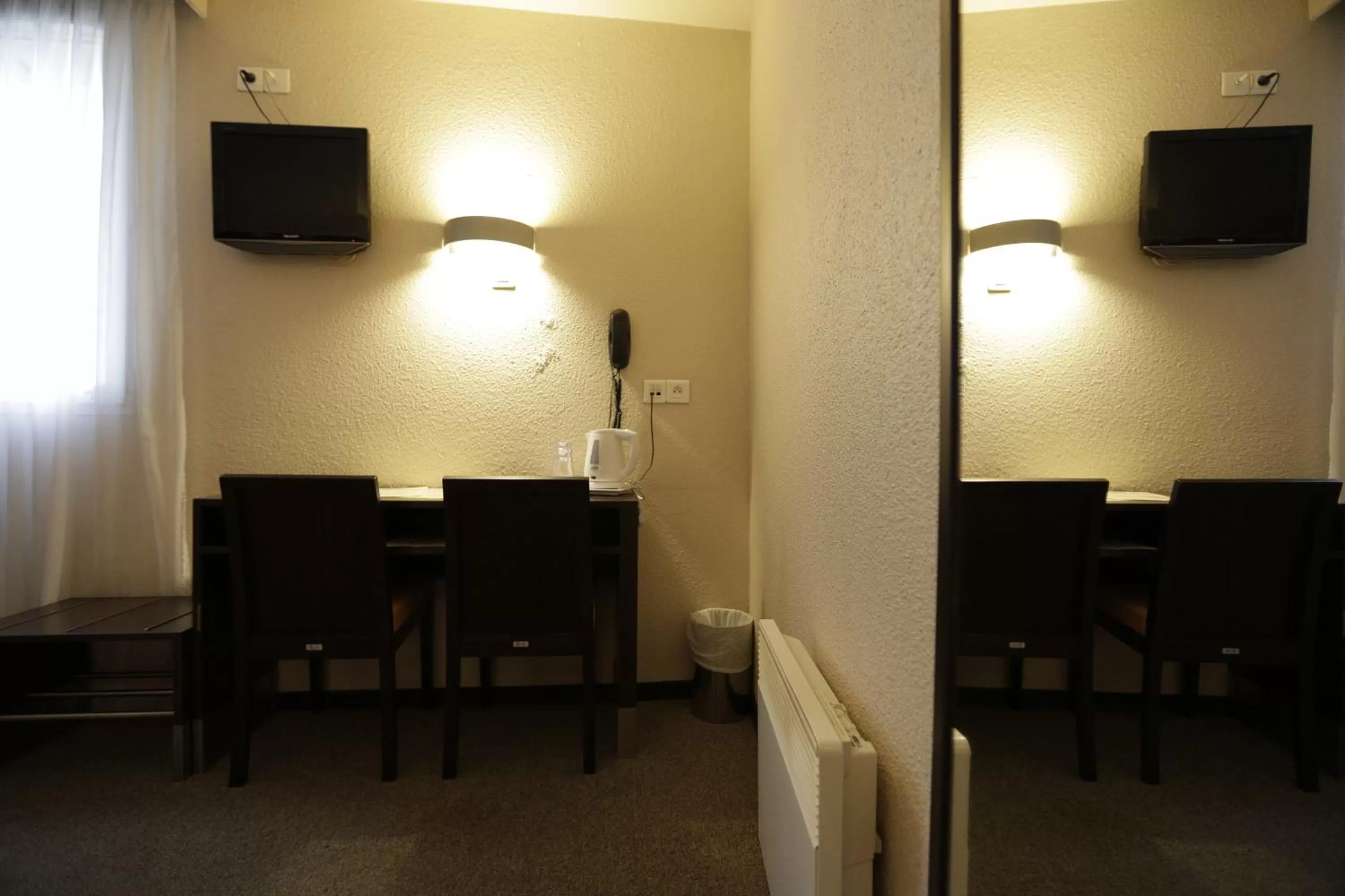 Bedroom in Hôtel Au Petit Caporal