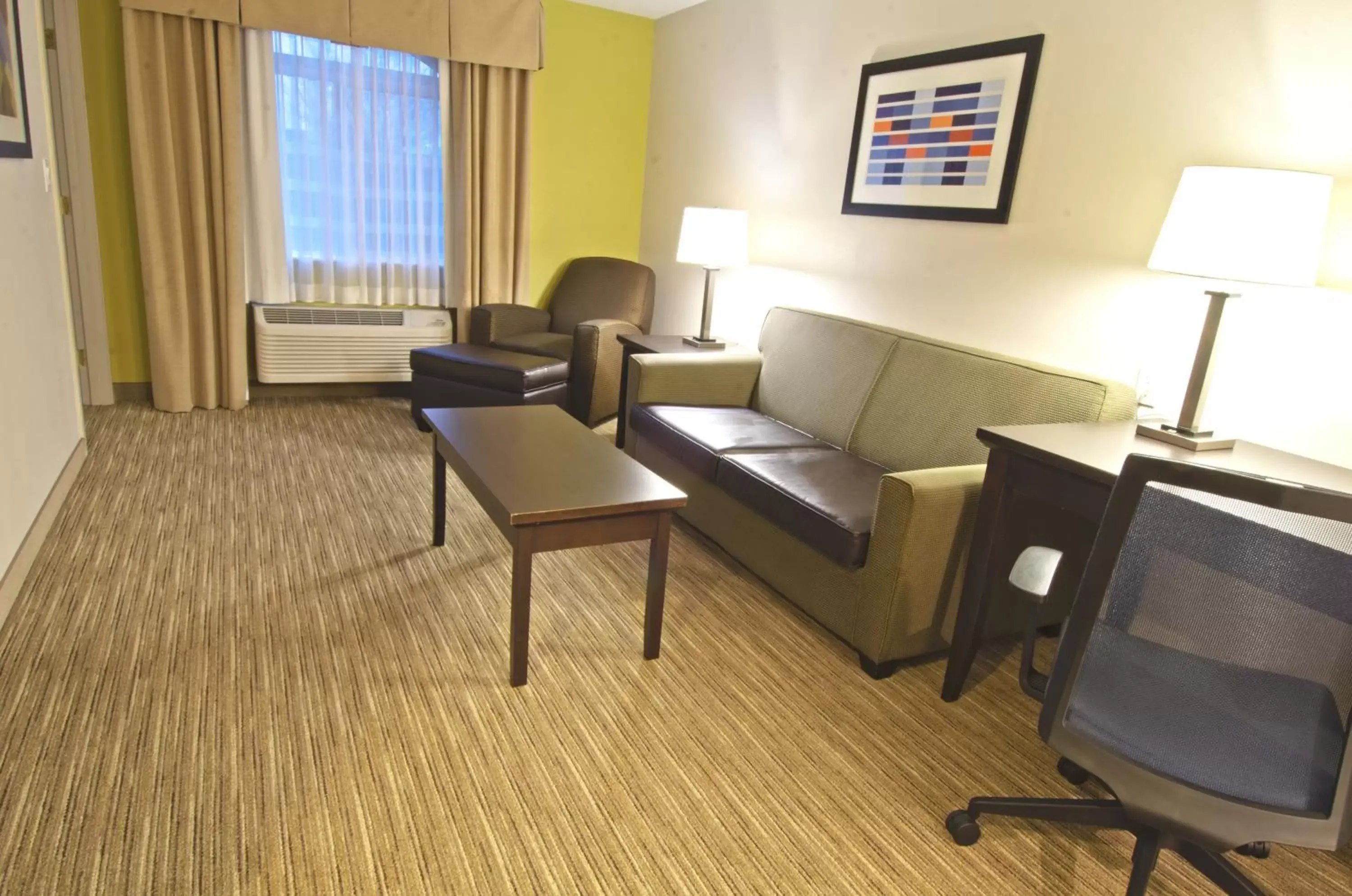 Bedroom, Seating Area in Holiday Inn Express & Suites Chicago-Libertyville, an IHG Hotel