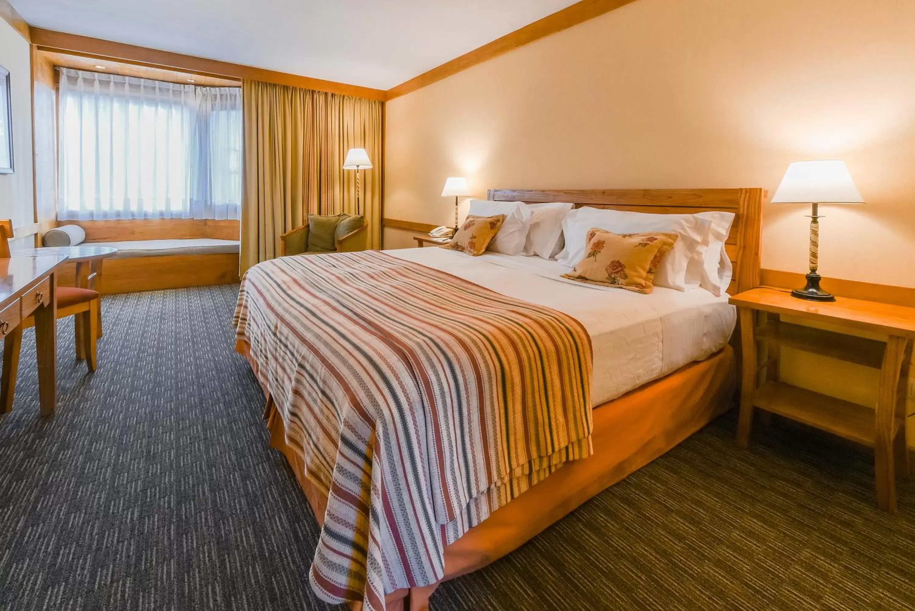 Bed in Mirador del Lago Hotel