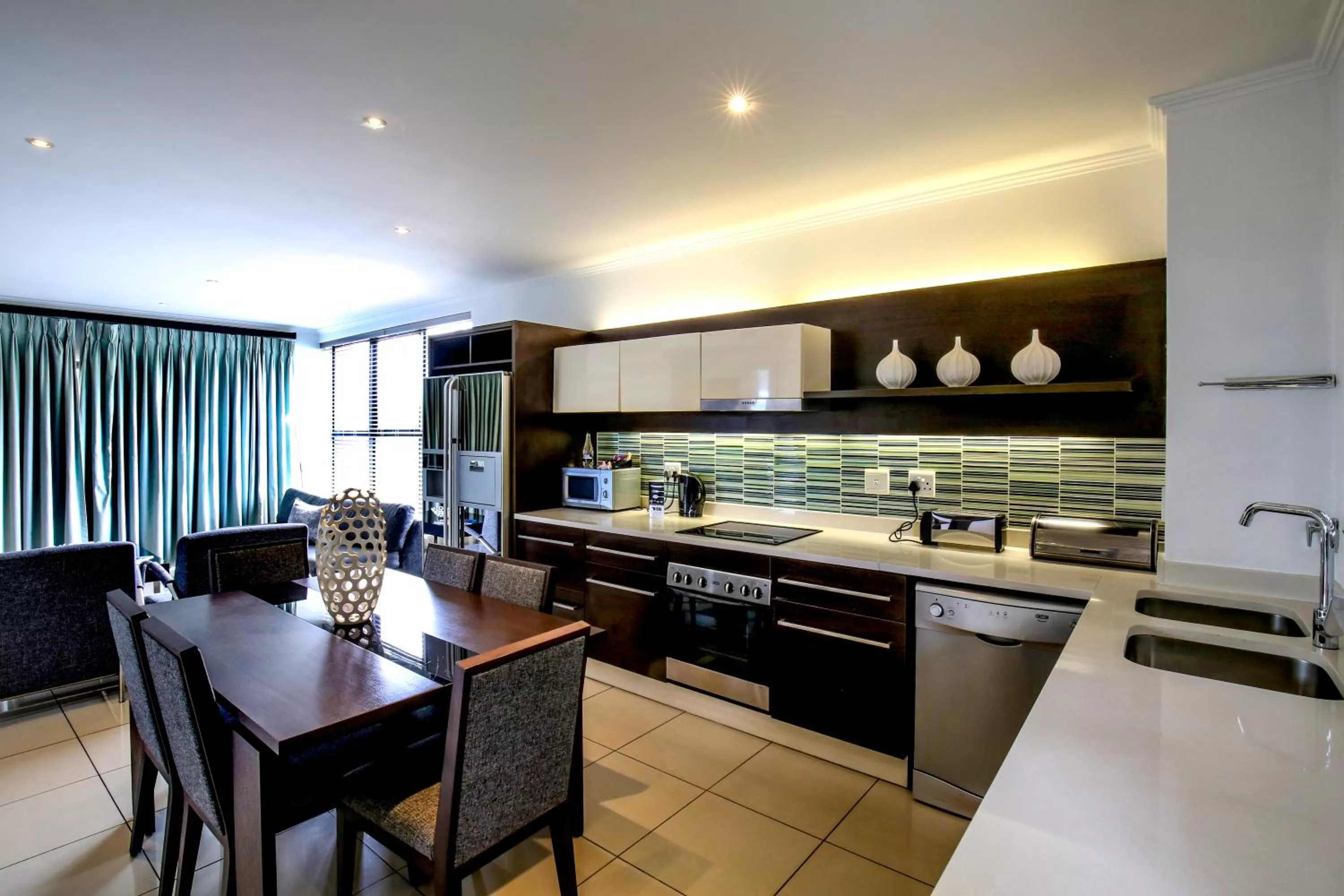 Kitchen or kitchenette in The Nicol Hotel and Apartments